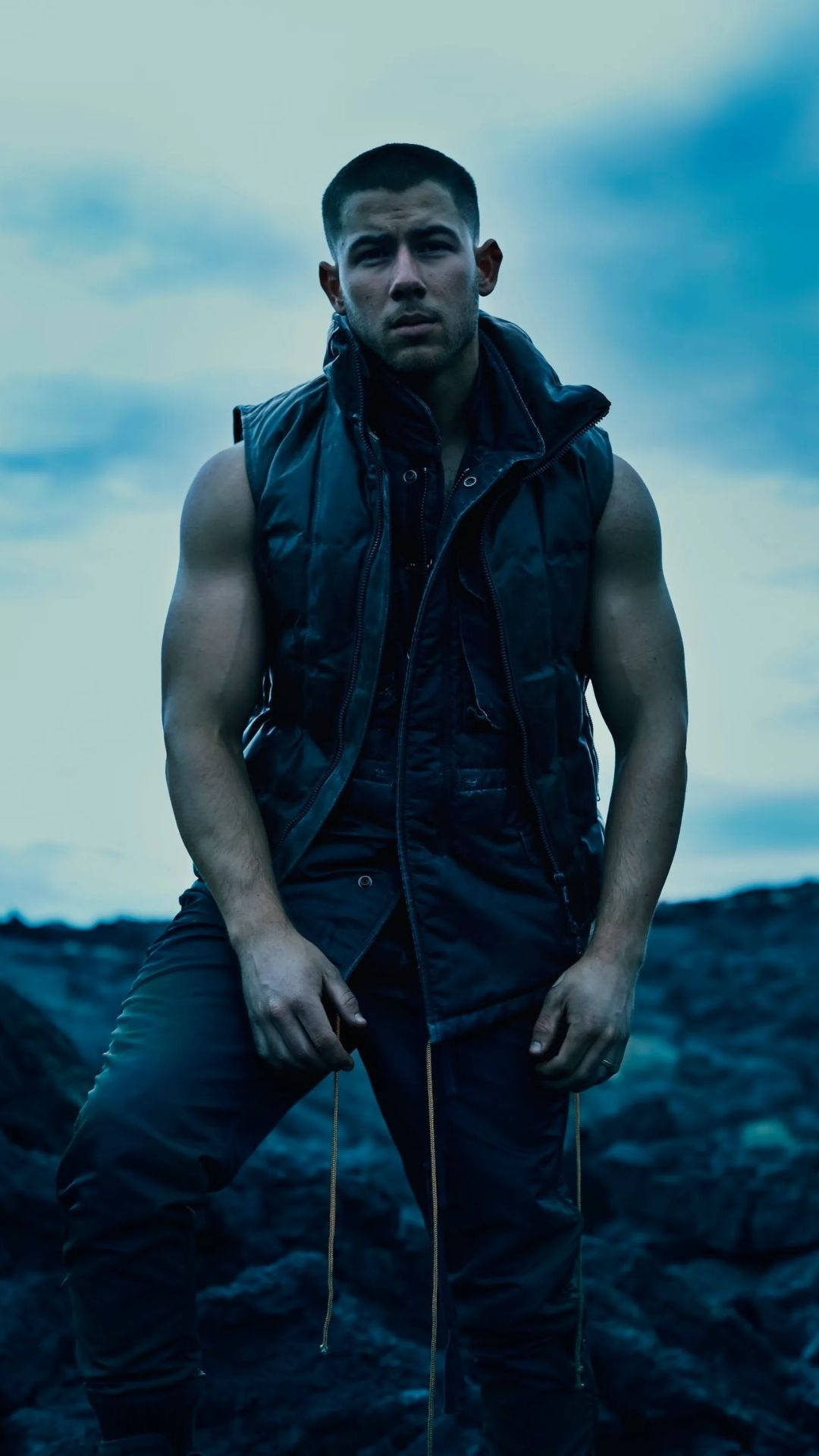Nick Jonas, rocky terrain, moody blue sky, Full HD Phone Wallpaper