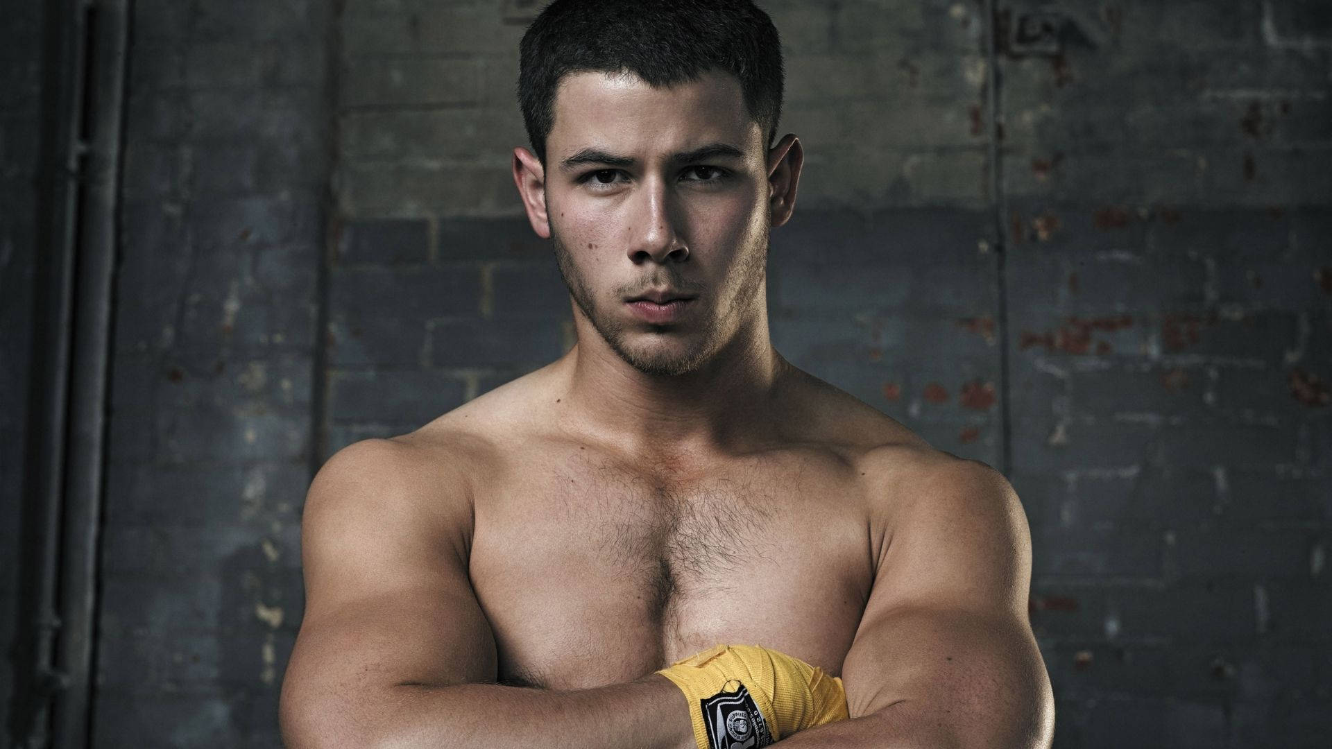 Nick Jonas, muscular man, arms crossed, Full HD Desktop Wallpaper