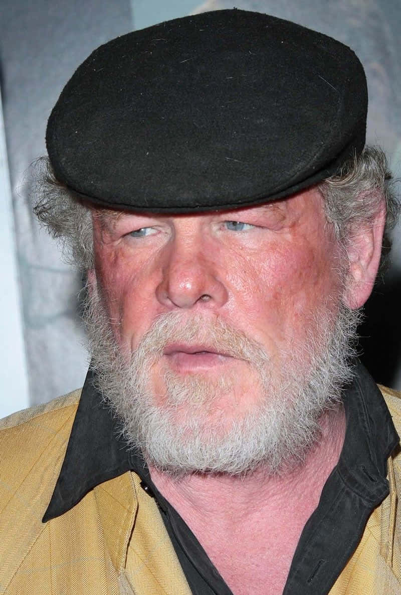Nick Nolte, gray beard, black flat cap, SD Phone Wallpaper