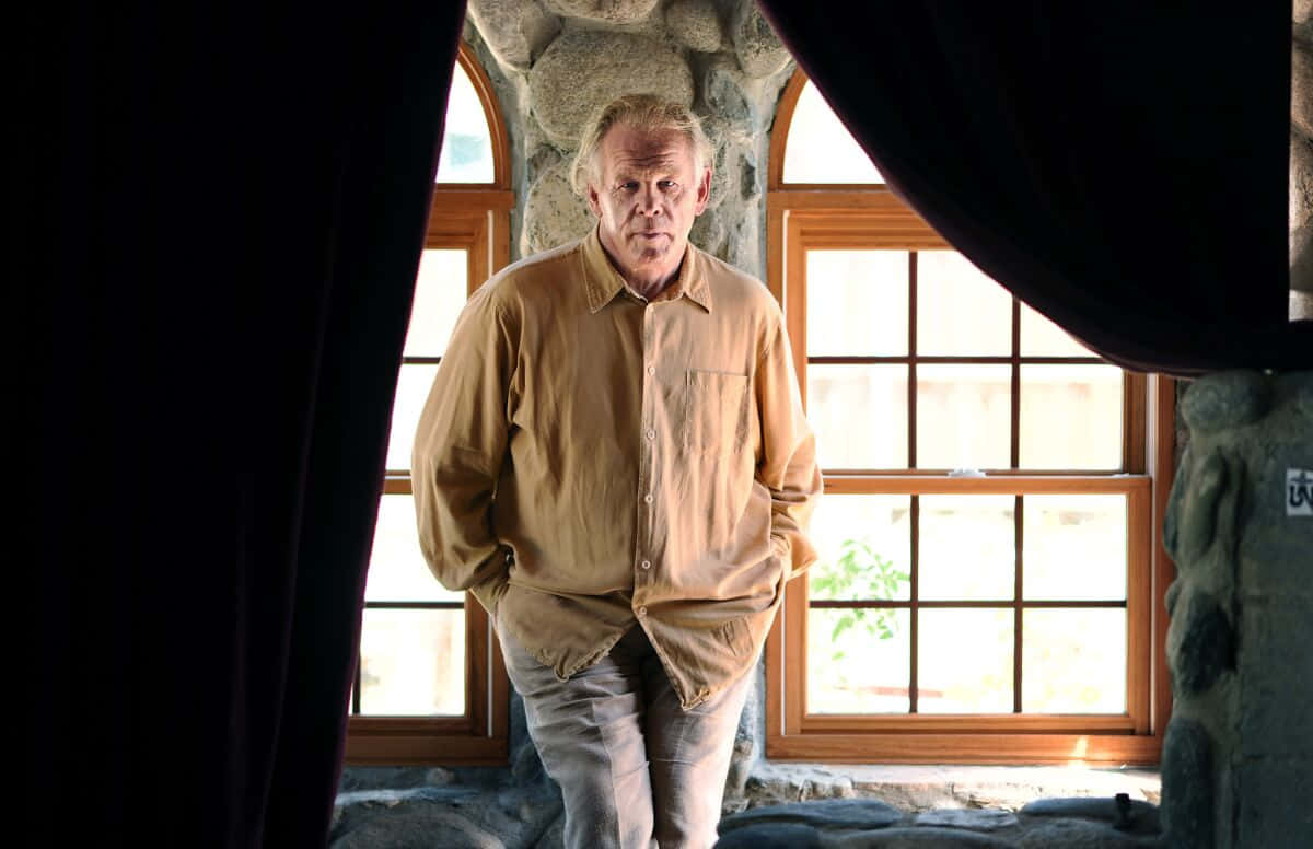 Nick Nolte, tan shirt, stone arches, SD Desktop Wallpaper