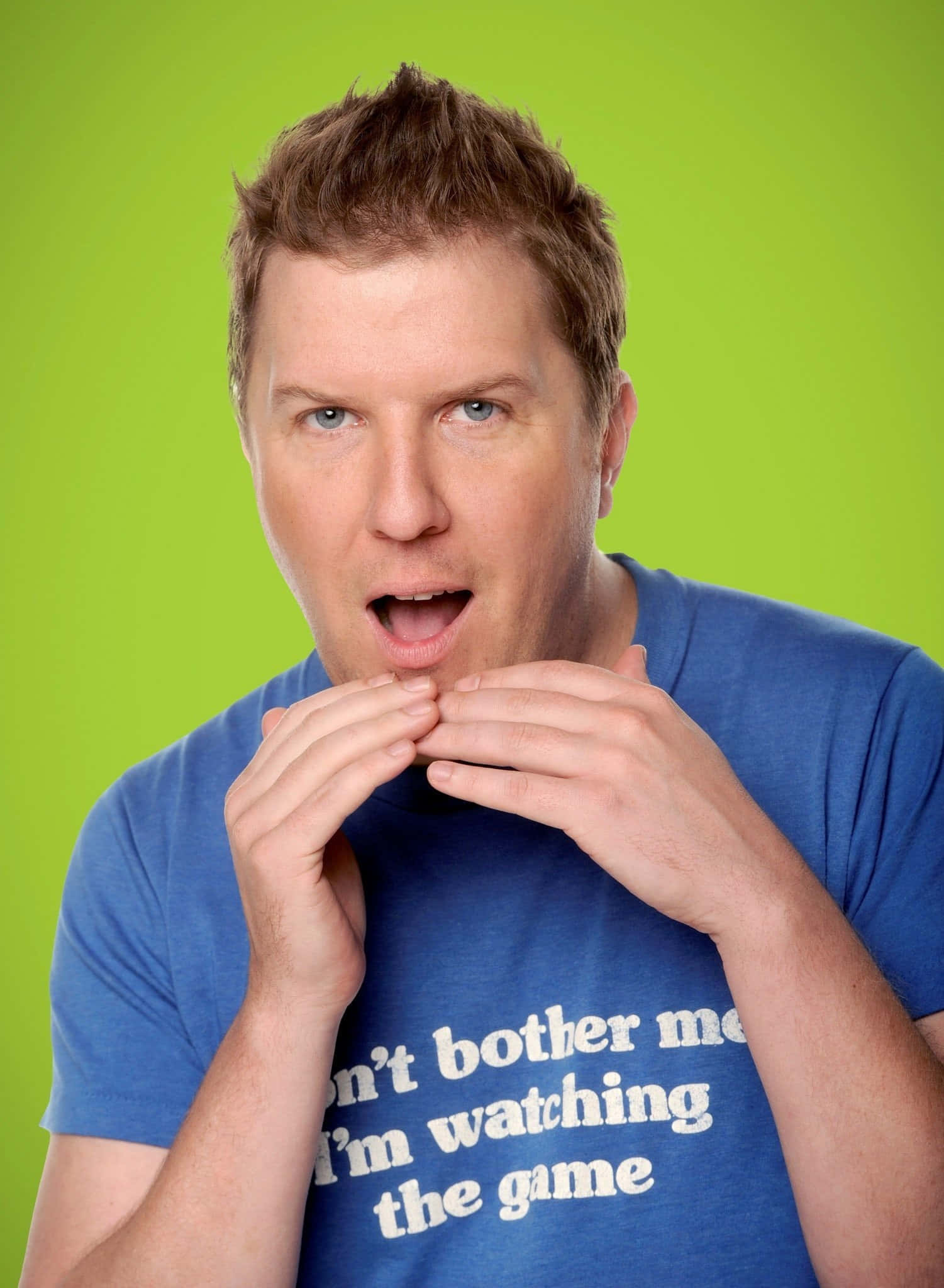 Nick Swardson, blue t-shirt, bright green background, Full HD Phone Wallpaper