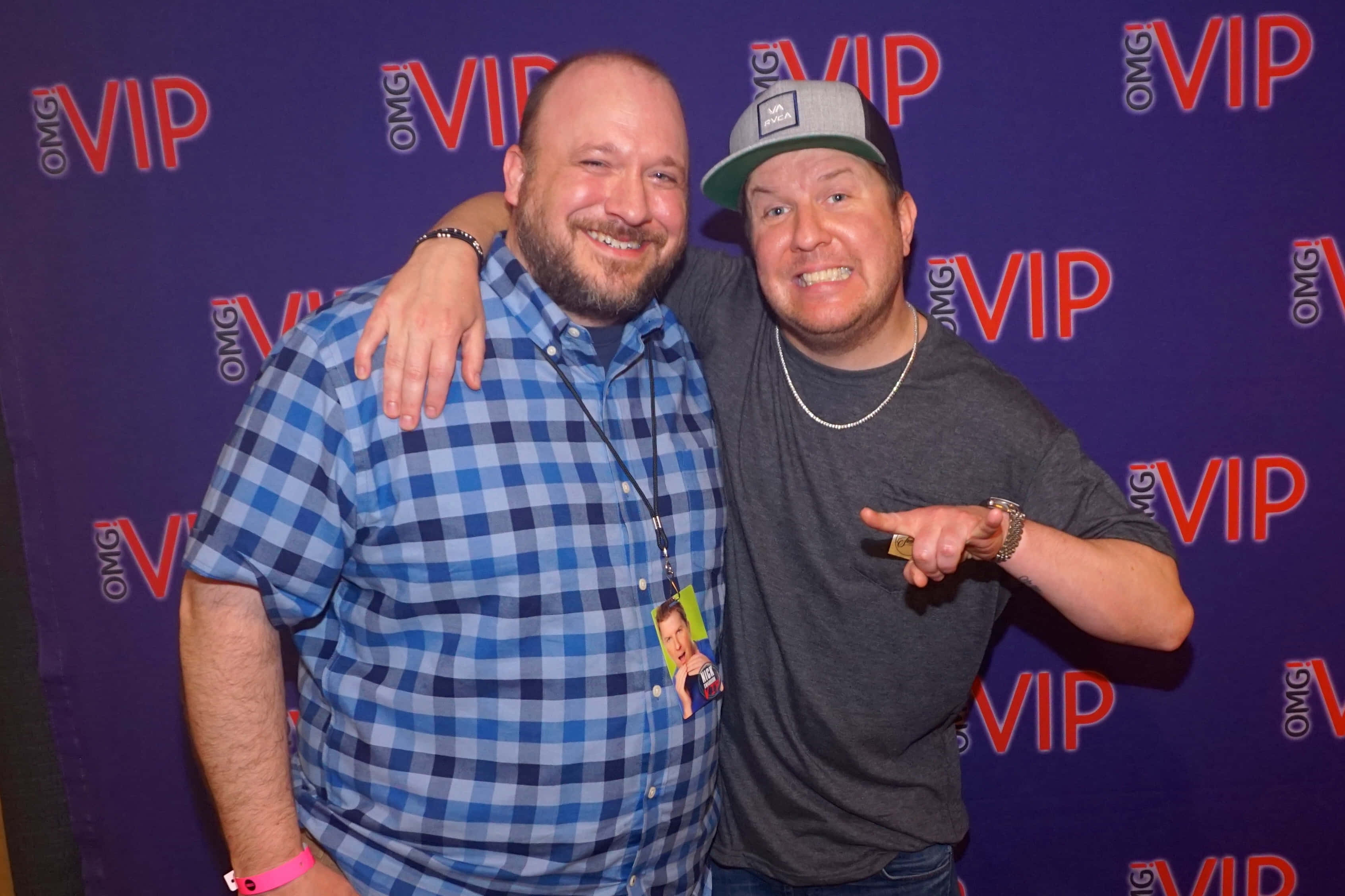 Nick Swardson, purple backdrop, red and white logos, 2K Desktop Wallpaper