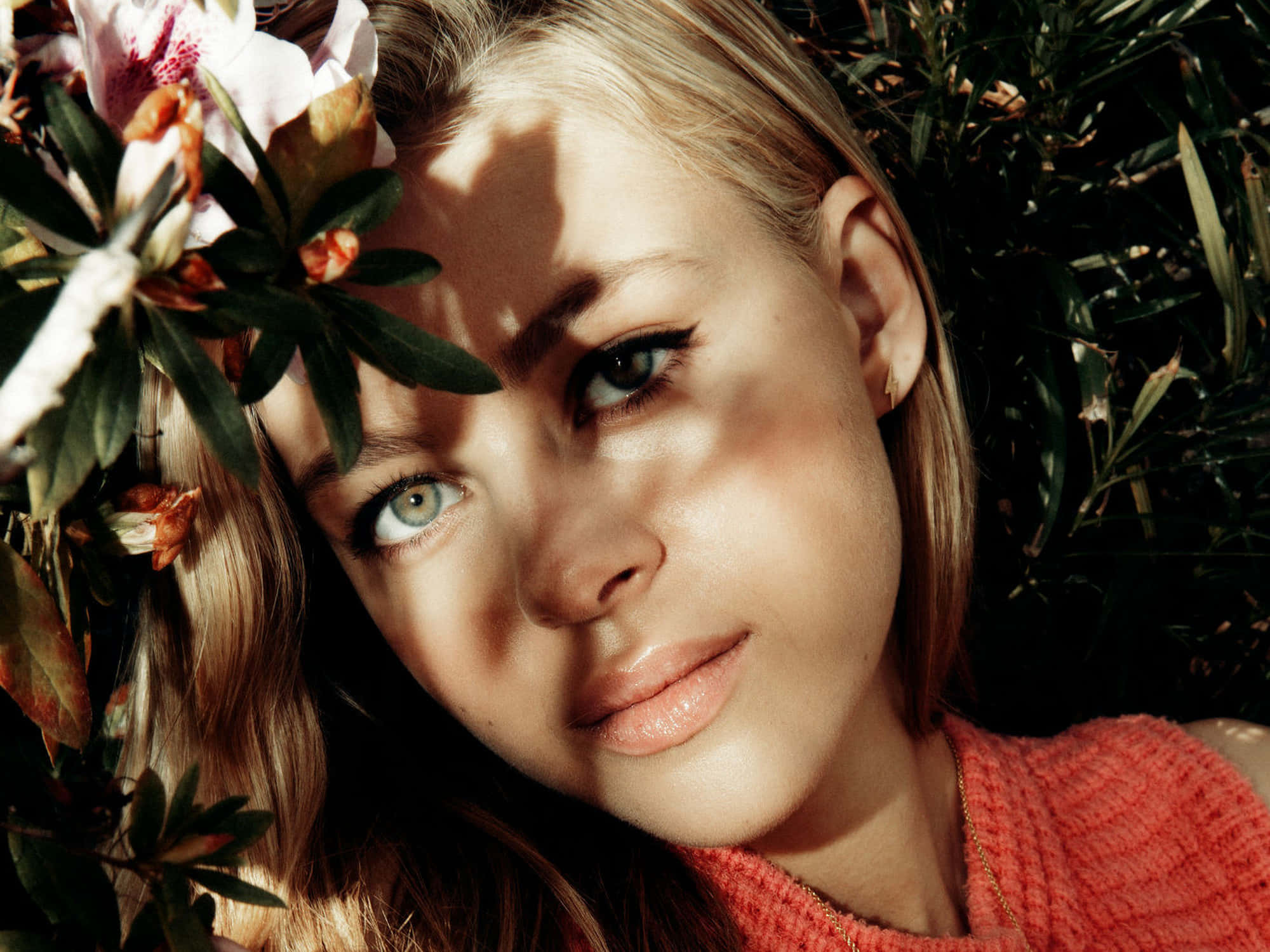 Nicola Peltz, floral backdrop, lush greenery, Full HD Desktop Wallpaper
