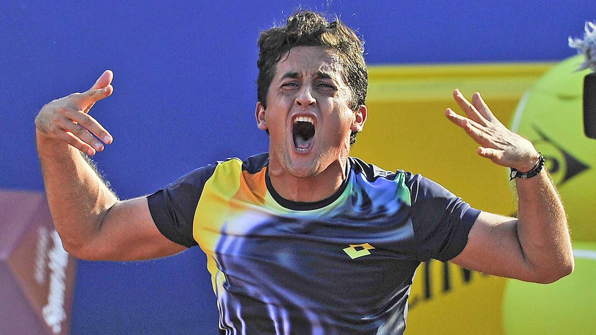 Nicolas Almagro, shouting in joy, vibrant blue and yellow backdrop, Full HD Desktop Wallpaper