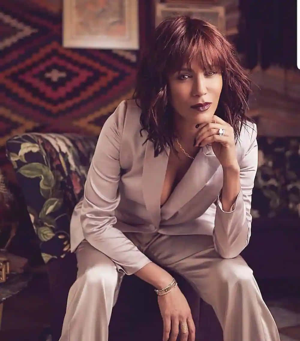 Nicole Ari Parker, cream satin suit, patterned rug, SD Phone Wallpaper