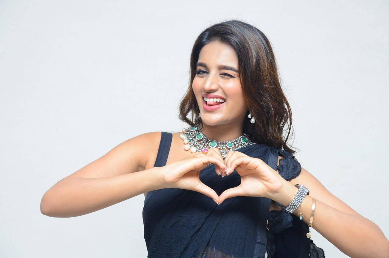 Nidhi Agarwal, iSmart Shankar, black sari, HD Desktop Wallpaper