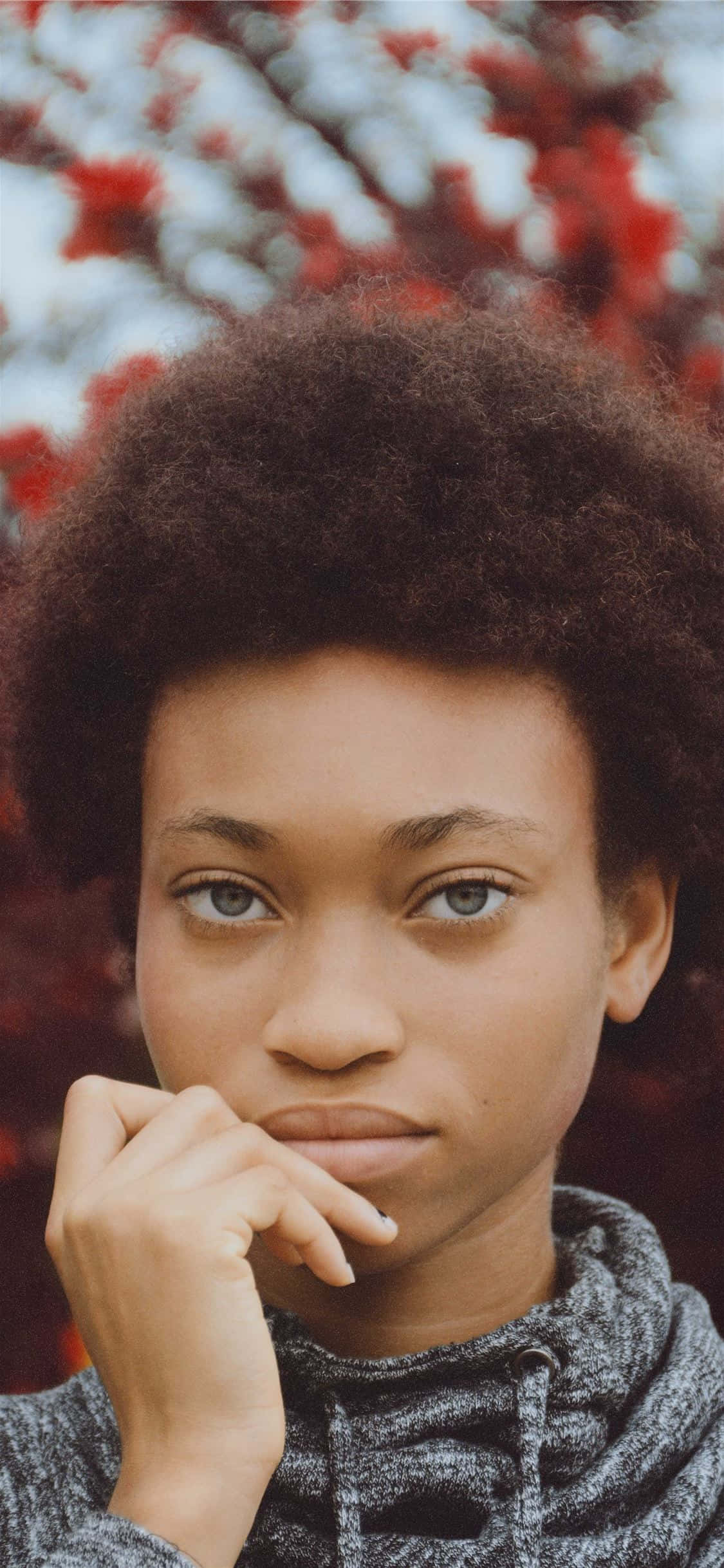 Nigerian Woman, voluminous afro, blurred red foliage background, Full HD Phone Wallpaper
