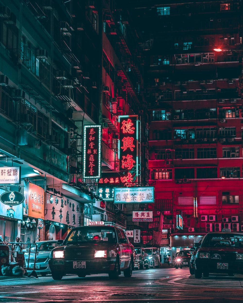 Night City Aesthetic, neon-lit urban alley, glowing red and blue signs, SD Phone Wallpaper