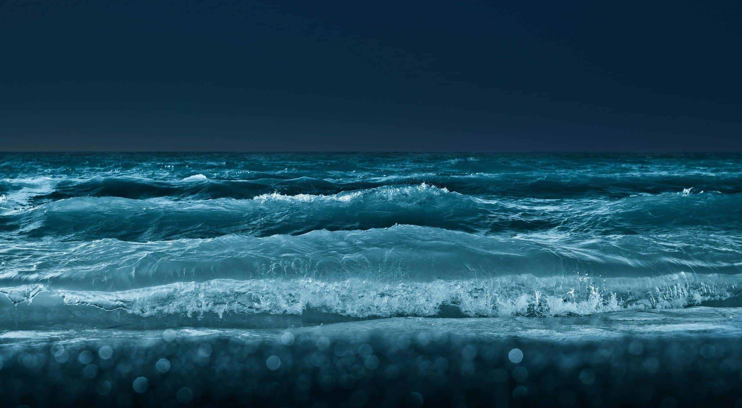 night sky, ocean waves, bokeh lights, 2K Desktop Wallpaper