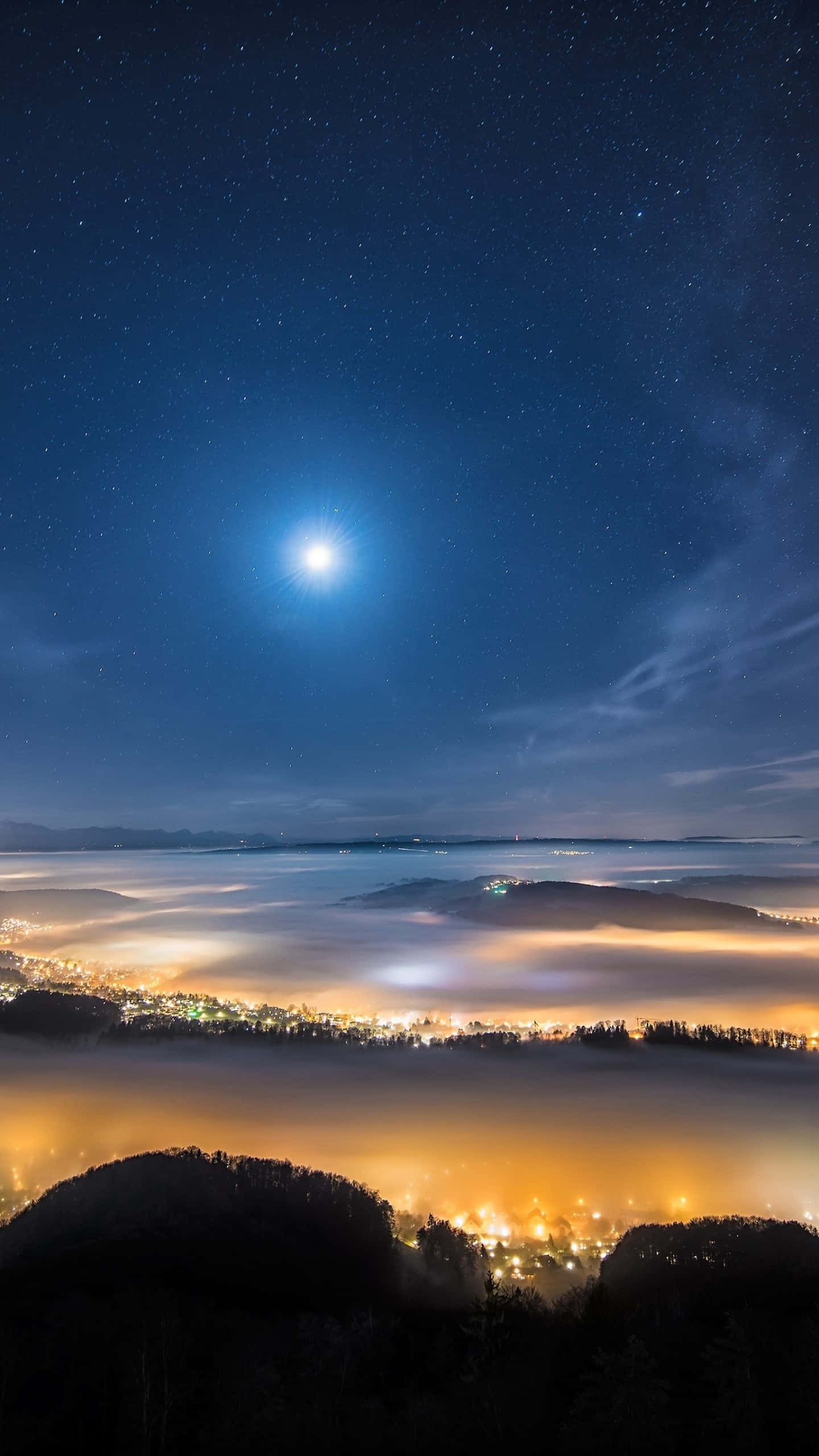 Starry Night Over Misty Town, luminous moon, glowing fog, 2K Phone Wallpaper