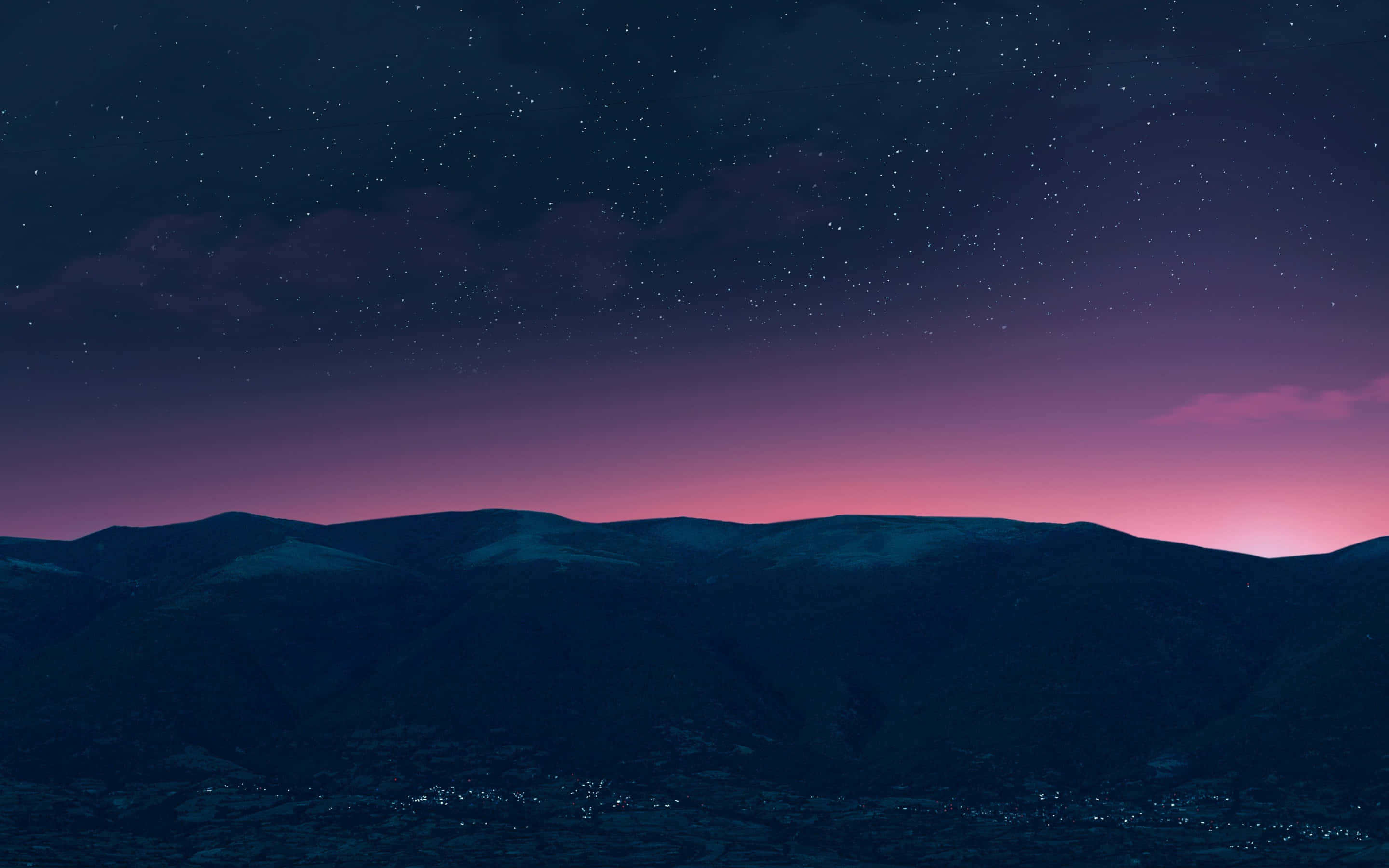 starry twilight sky, purple and pink hues, silhouetted mountains, 2K Desktop Wallpaper