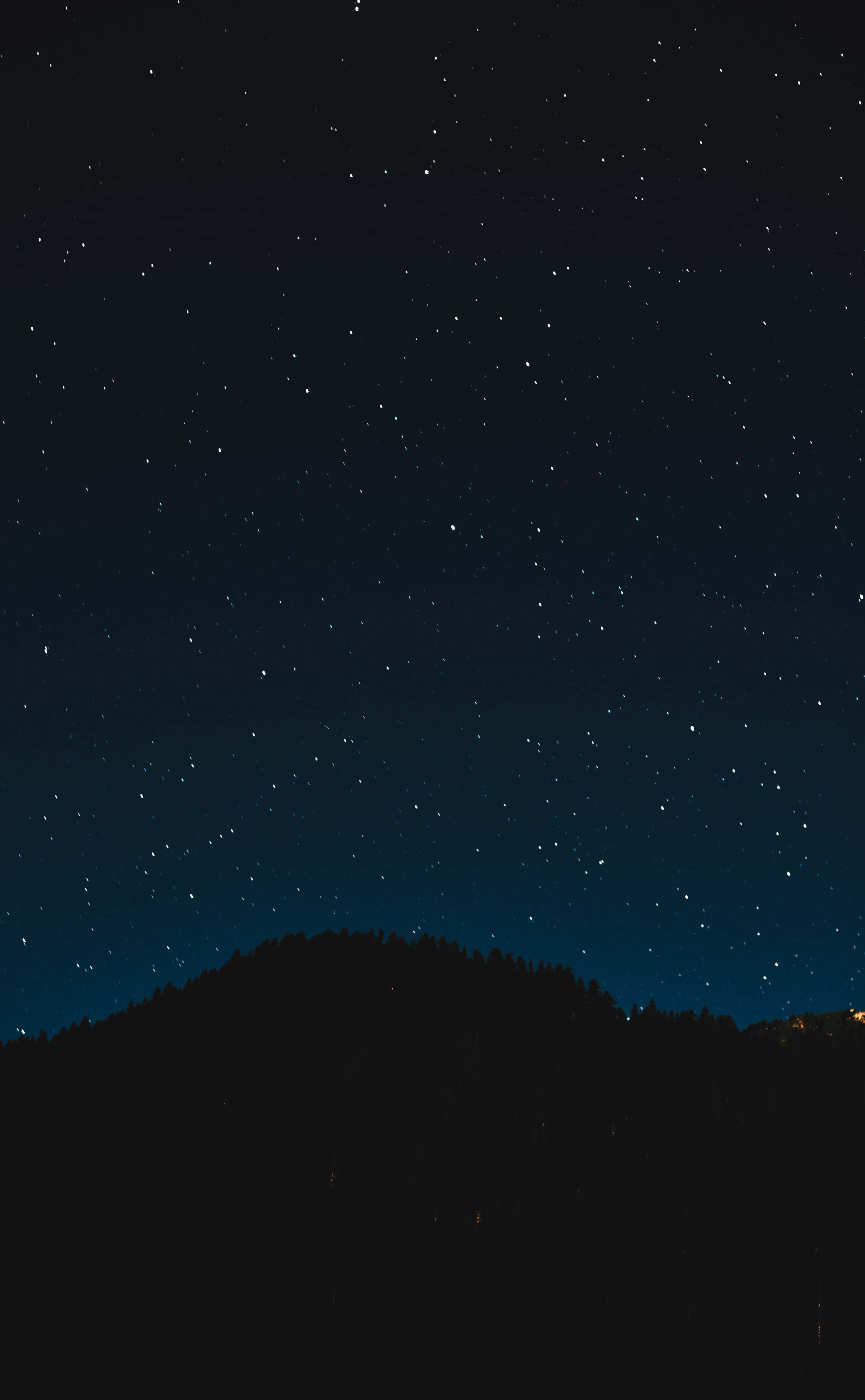 starry night sky, dark forested hill, distant lights, 4K Phone Wallpaper