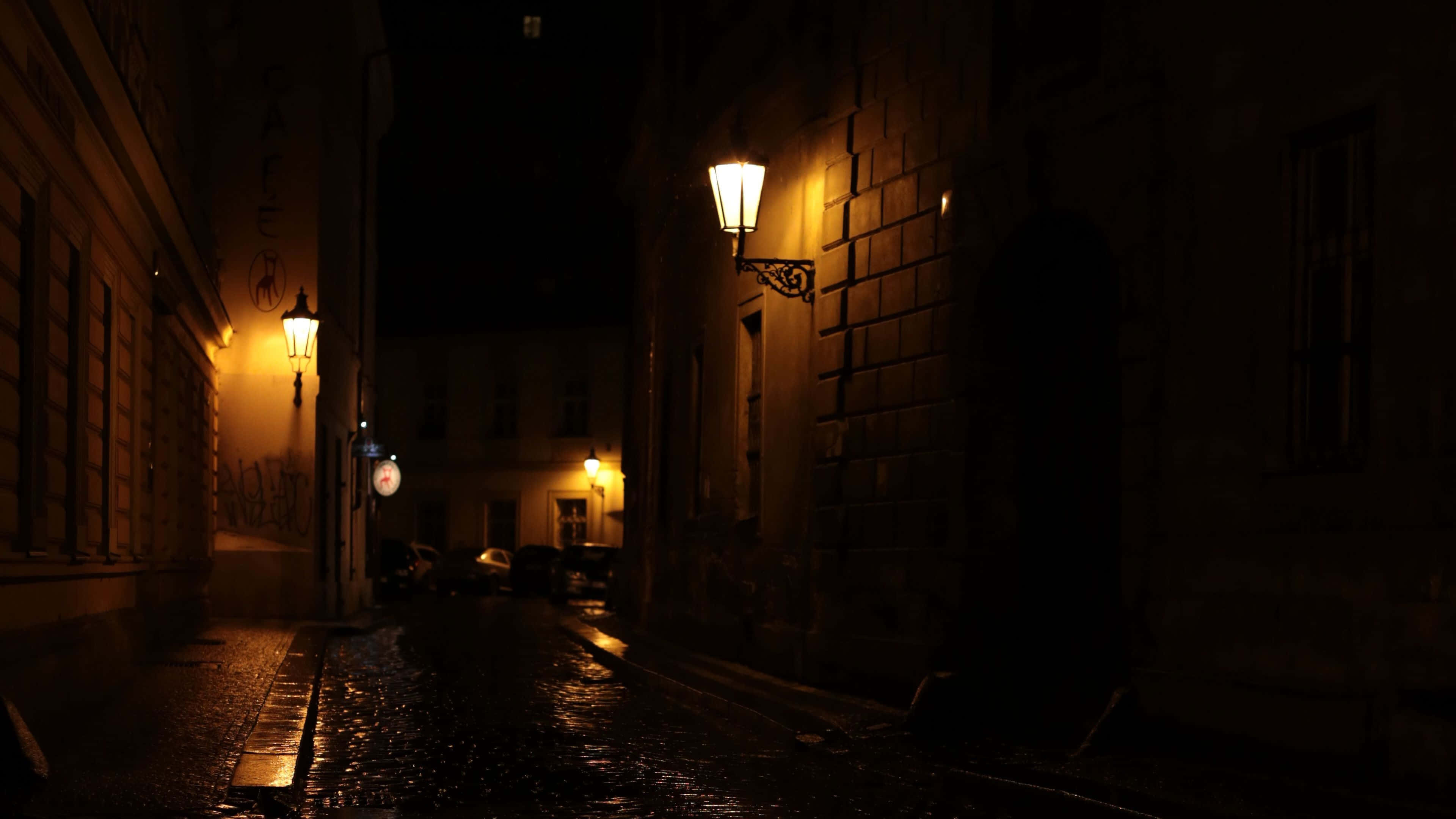 night, cobblestone alley, warm glowing lanterns, 4K Desktop Wallpaper