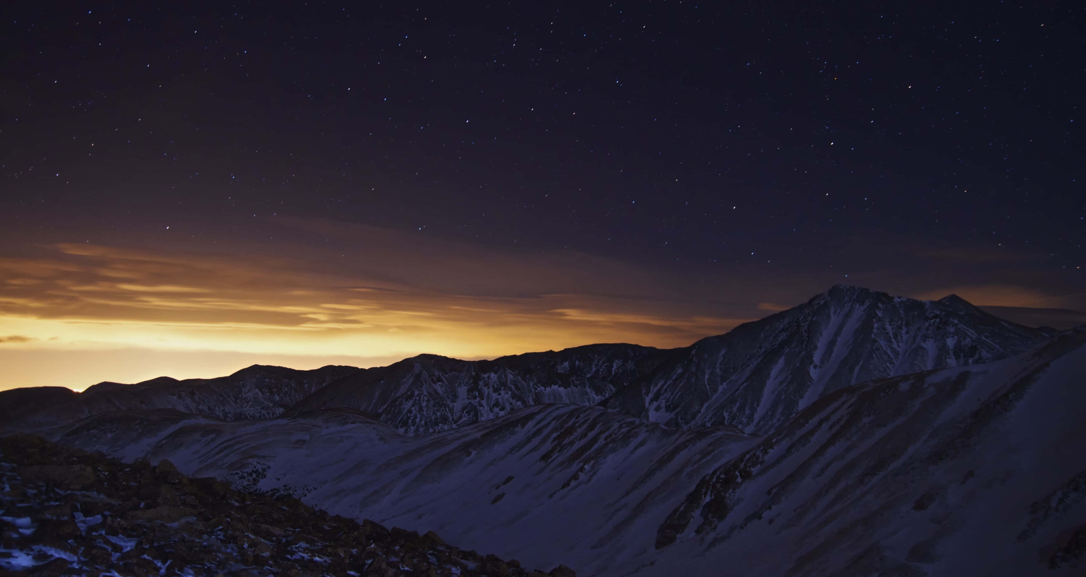 serene moonlit sky, snowcapped mountains, starry night sky, 2K Desktop Wallpaper