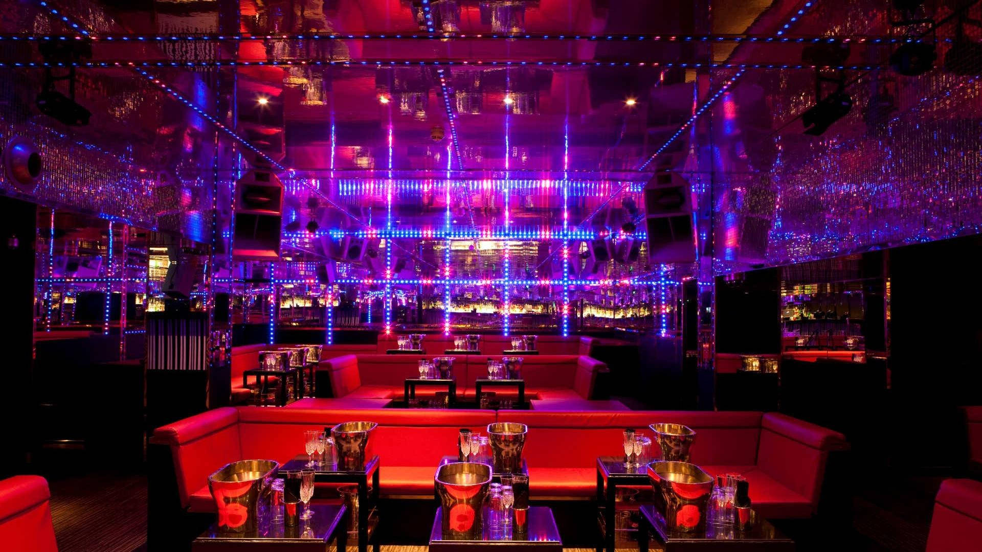 modern night bar and club, mirrored walls, vibrant red purple lighting, Full HD Desktop Wallpaper