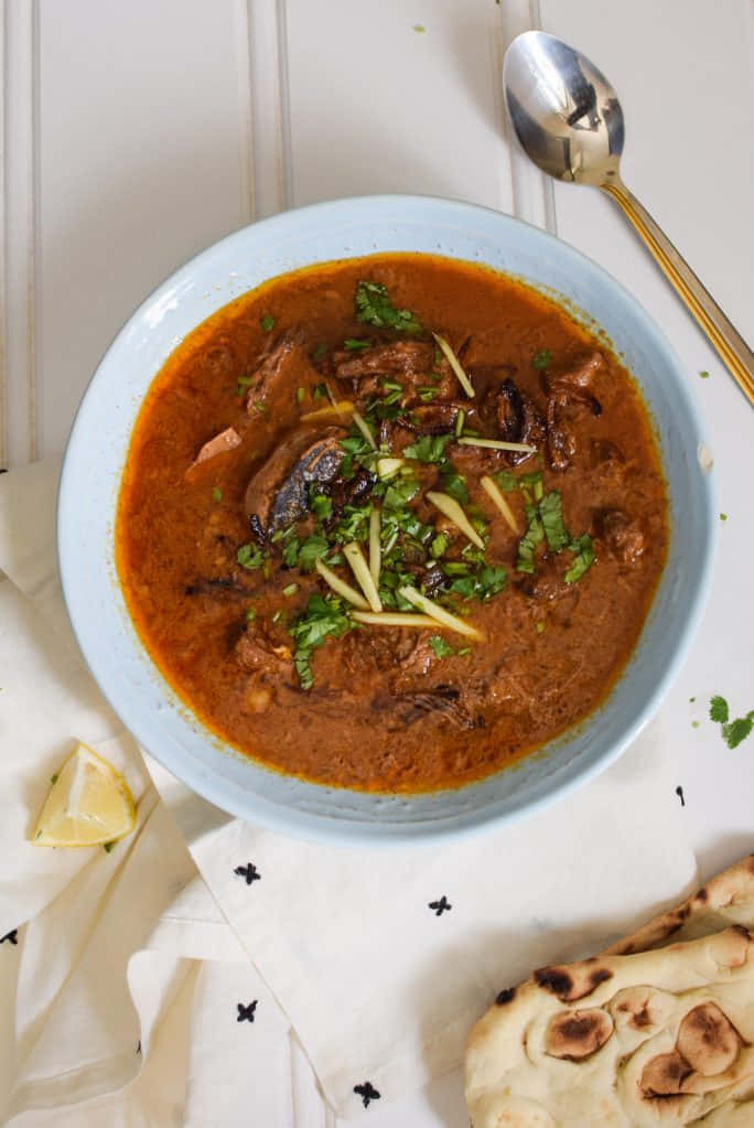 Nihari, light blue bowl, cilantro, SD Phone Wallpaper