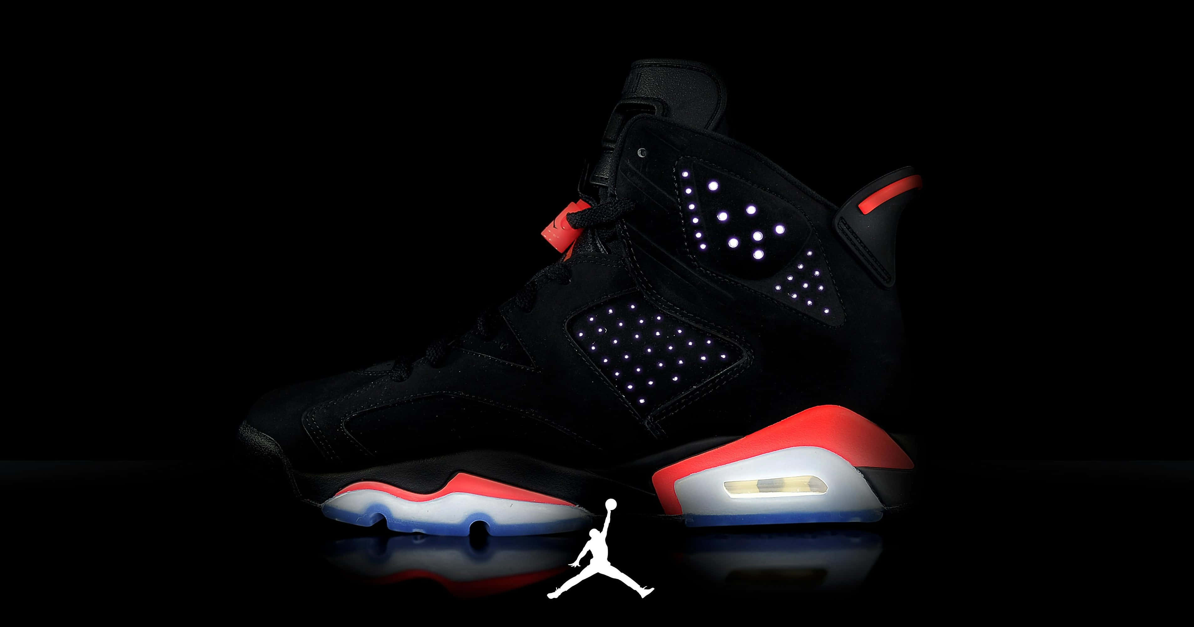 Nike Air Jordan, black Jordan sneaker, glowing red white and blue accents, 2K Desktop Wallpaper