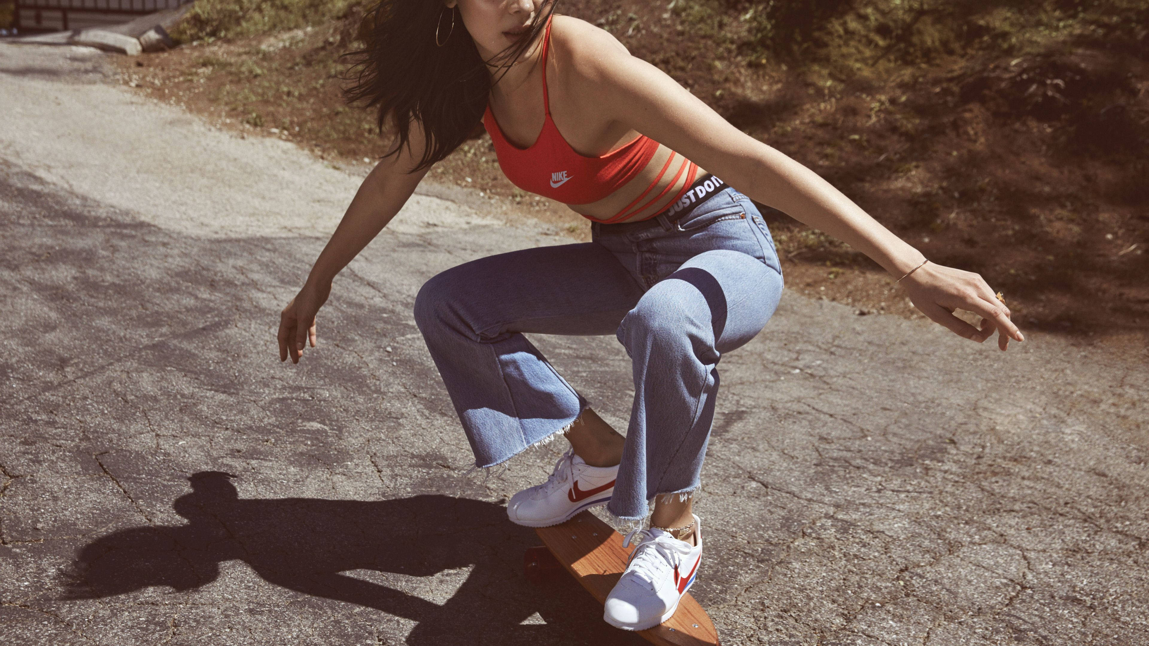 Nike girl, short board, orange top, 4K Desktop Wallpaper