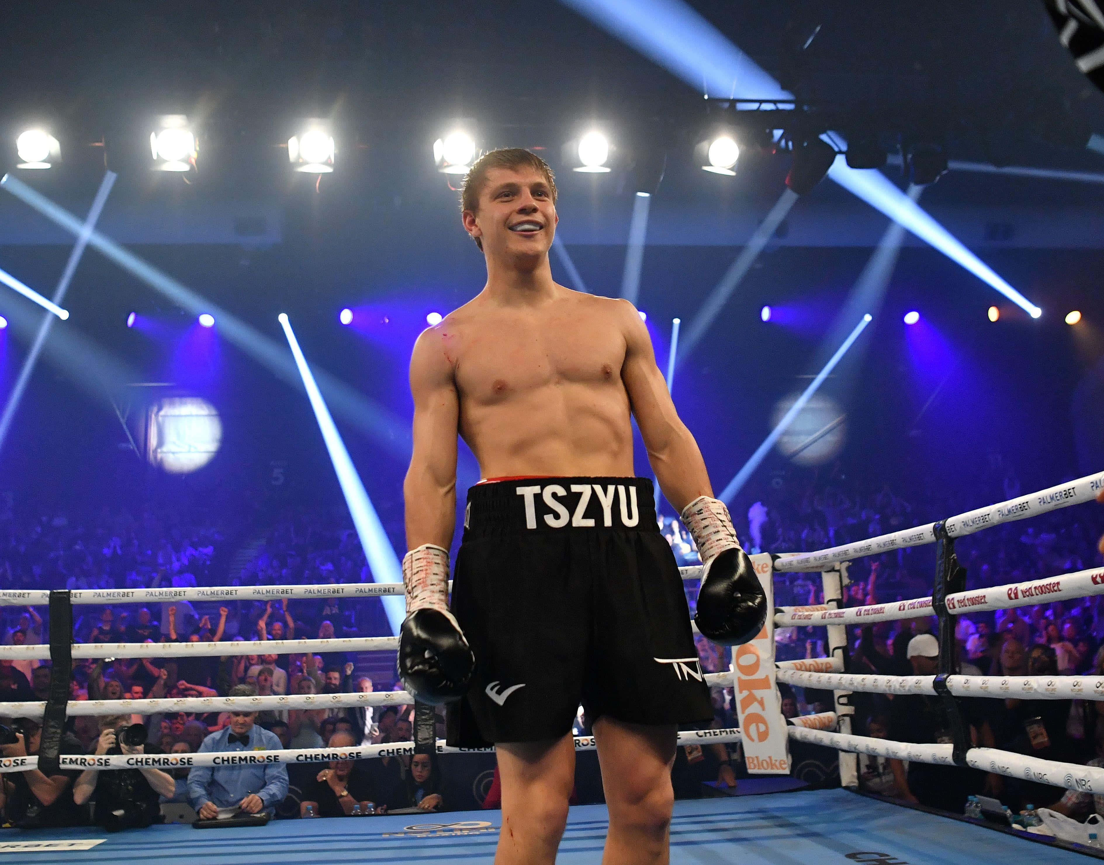 Nikita Tszyu, black shorts, brightly lit ring, 2K Desktop Wallpaper