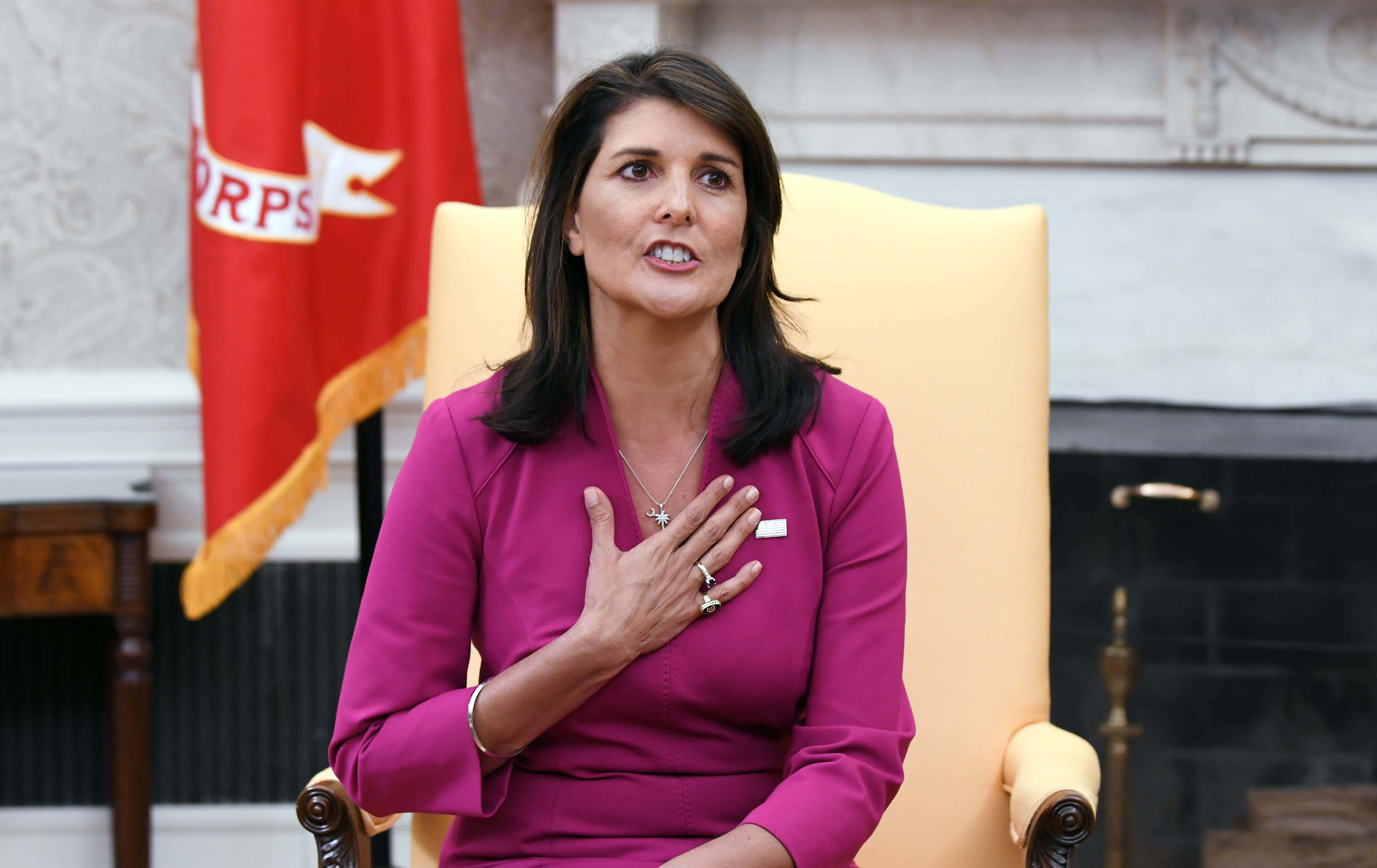Nikki Haley, magenta dress, yellow chair, 4K Desktop Wallpaper