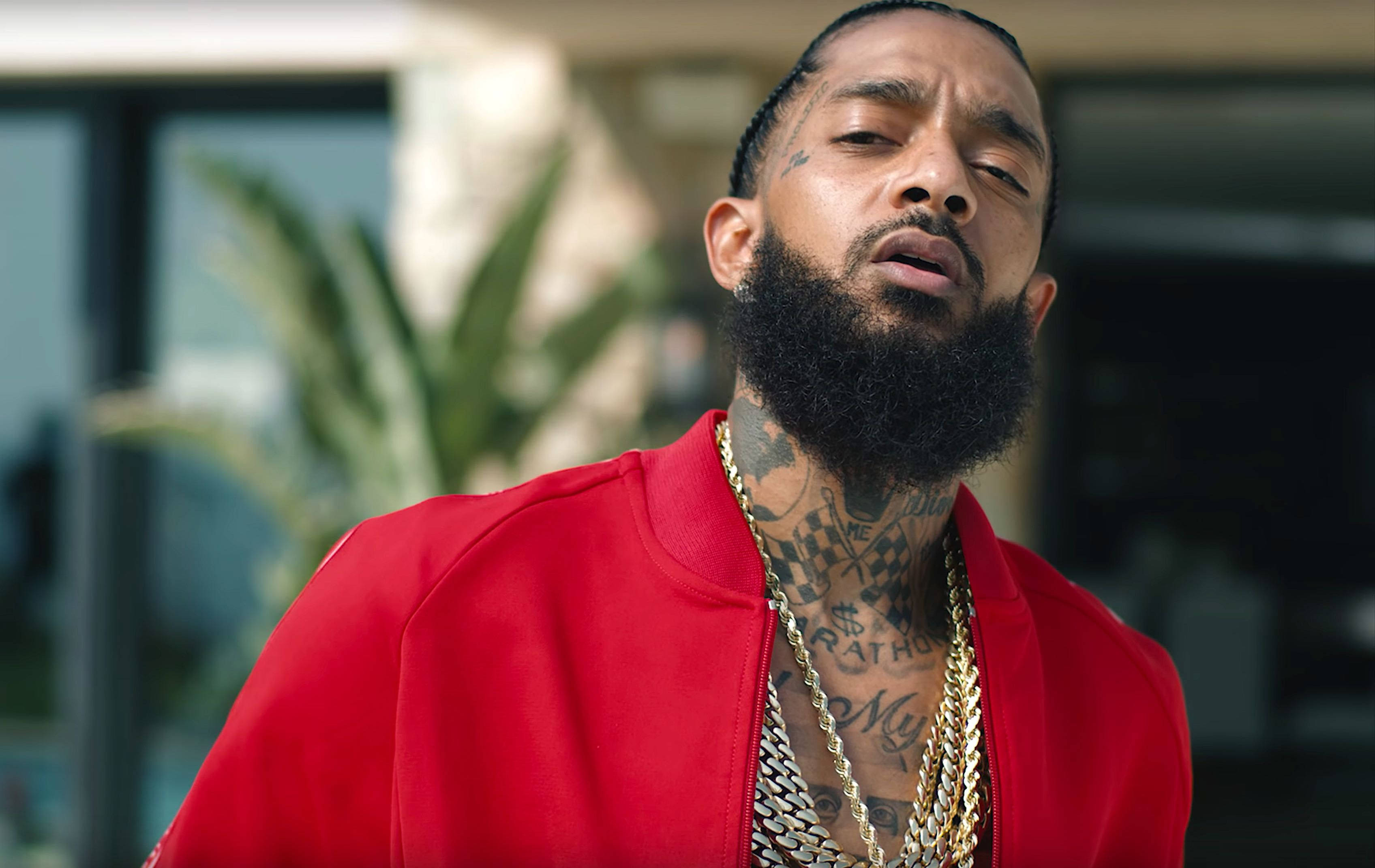 Nipsey Hussle, red jacket, gold chains, 2K Desktop Wallpaper