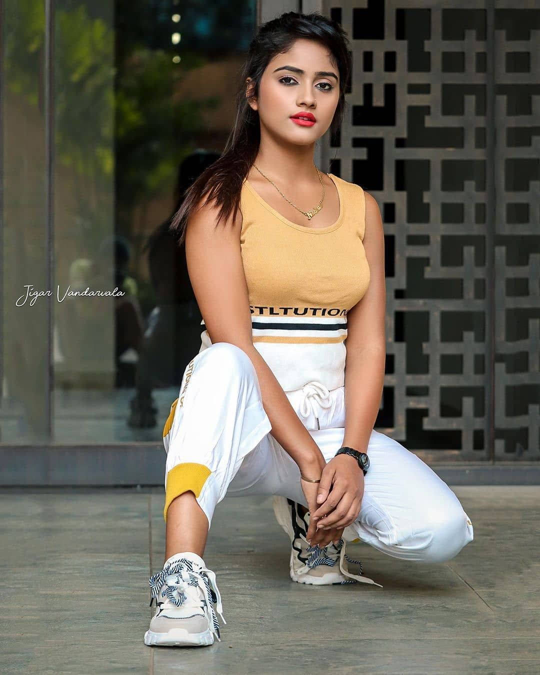 Nisha Guragain, yellow sleeveless top, white joggers, HD Phone Wallpaper