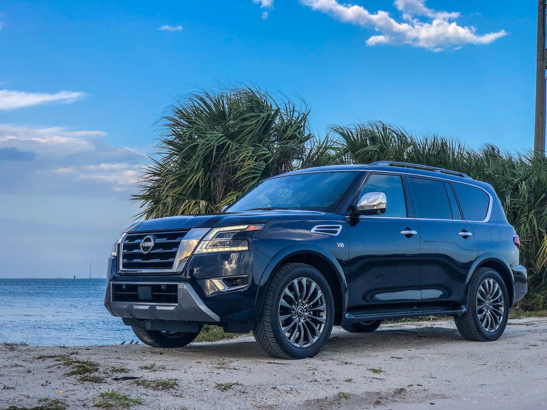Nissan Armada, sleek black, sandy beach, Full HD Desktop Wallpaper