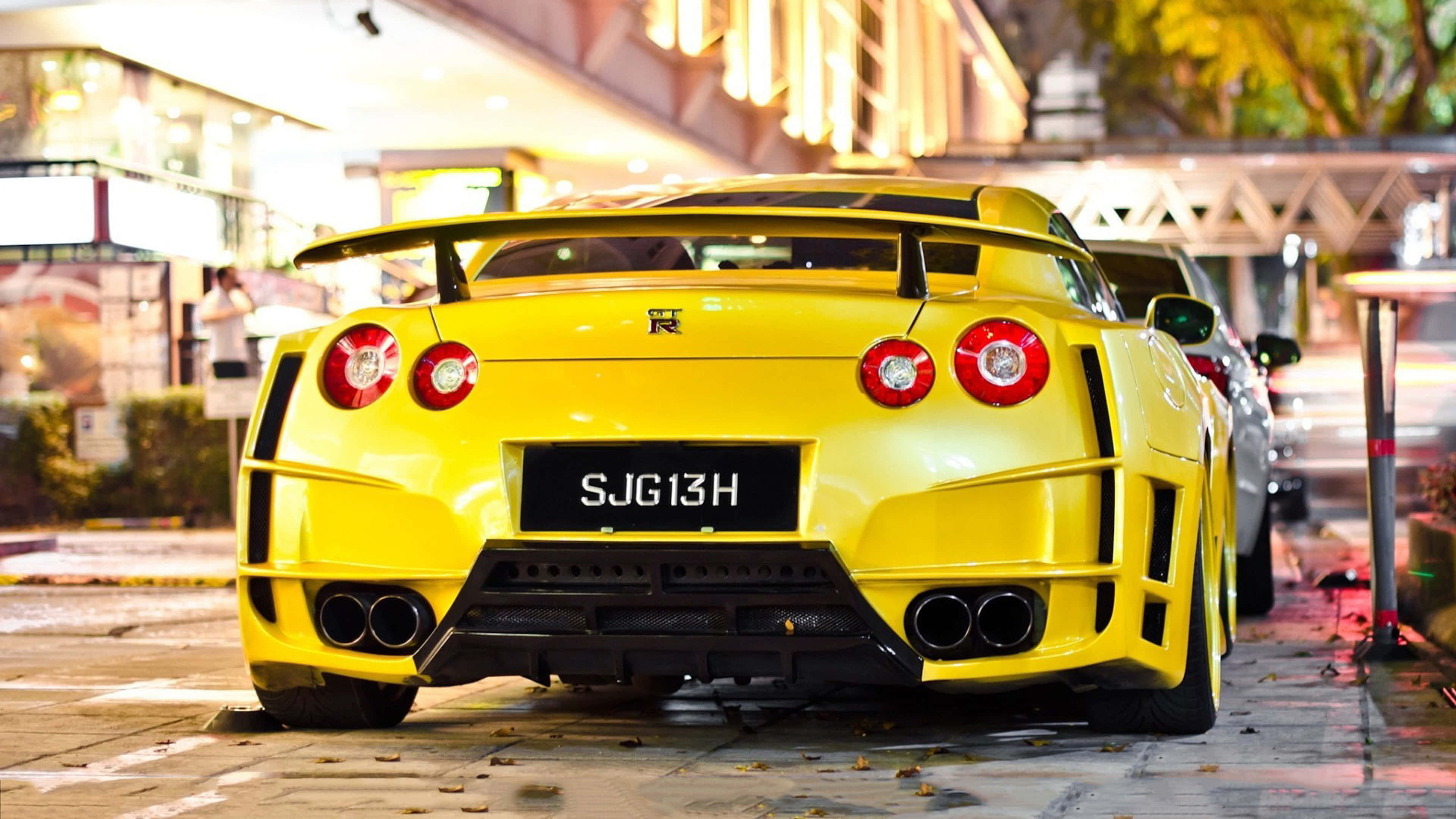 Nissan GT-R, yellow, glowing red taillights, 4K Desktop Wallpaper
