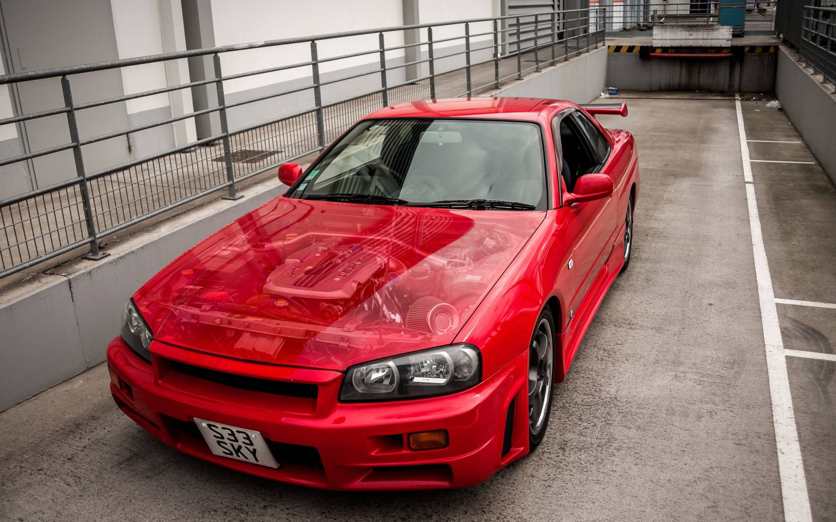 Nissan Skyline GTR R34, glossy red, concrete parking garage, HD Desktop Wallpaper