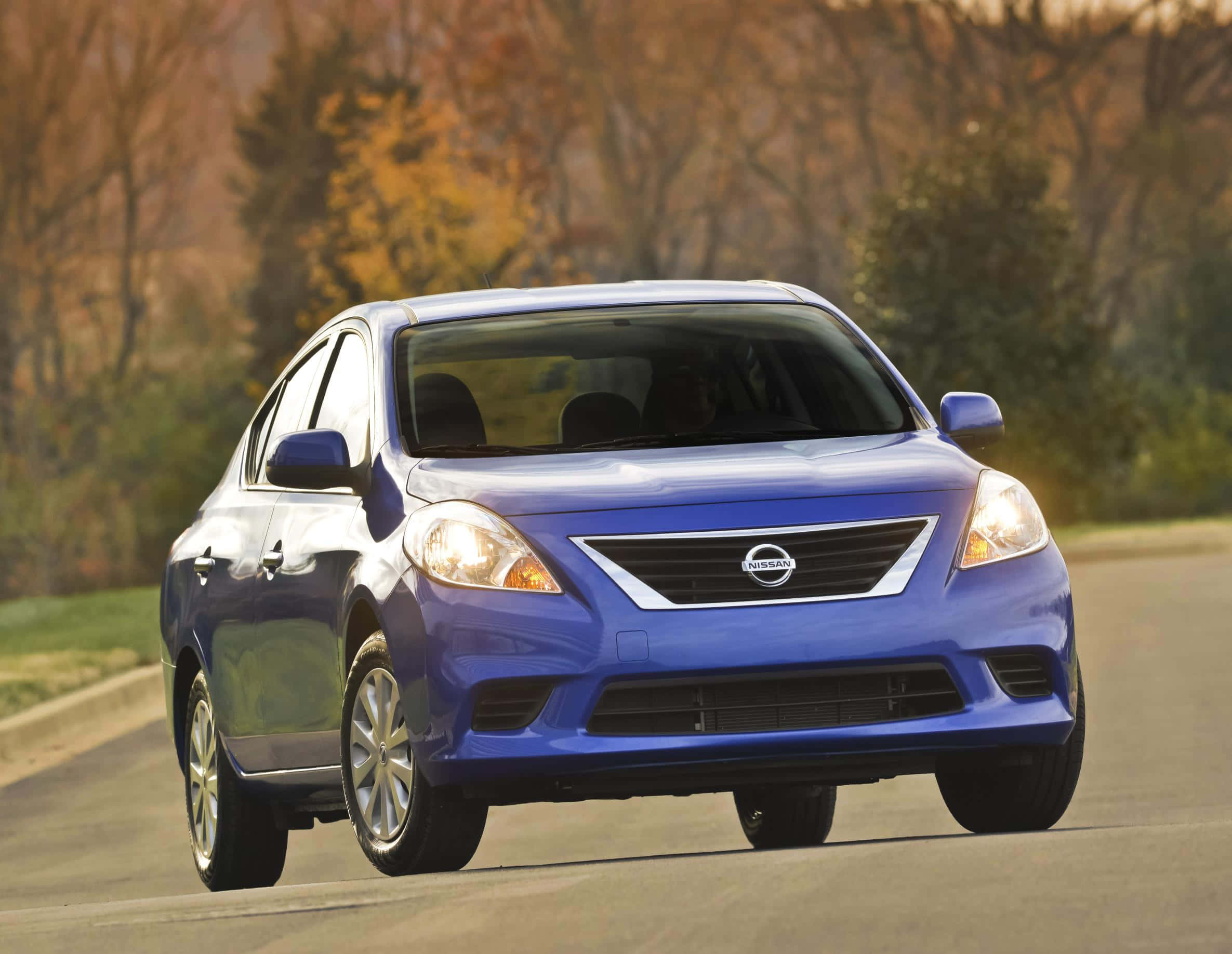 Nissan Versa, vibrant blue, autumn trees, Full HD Desktop Wallpaper