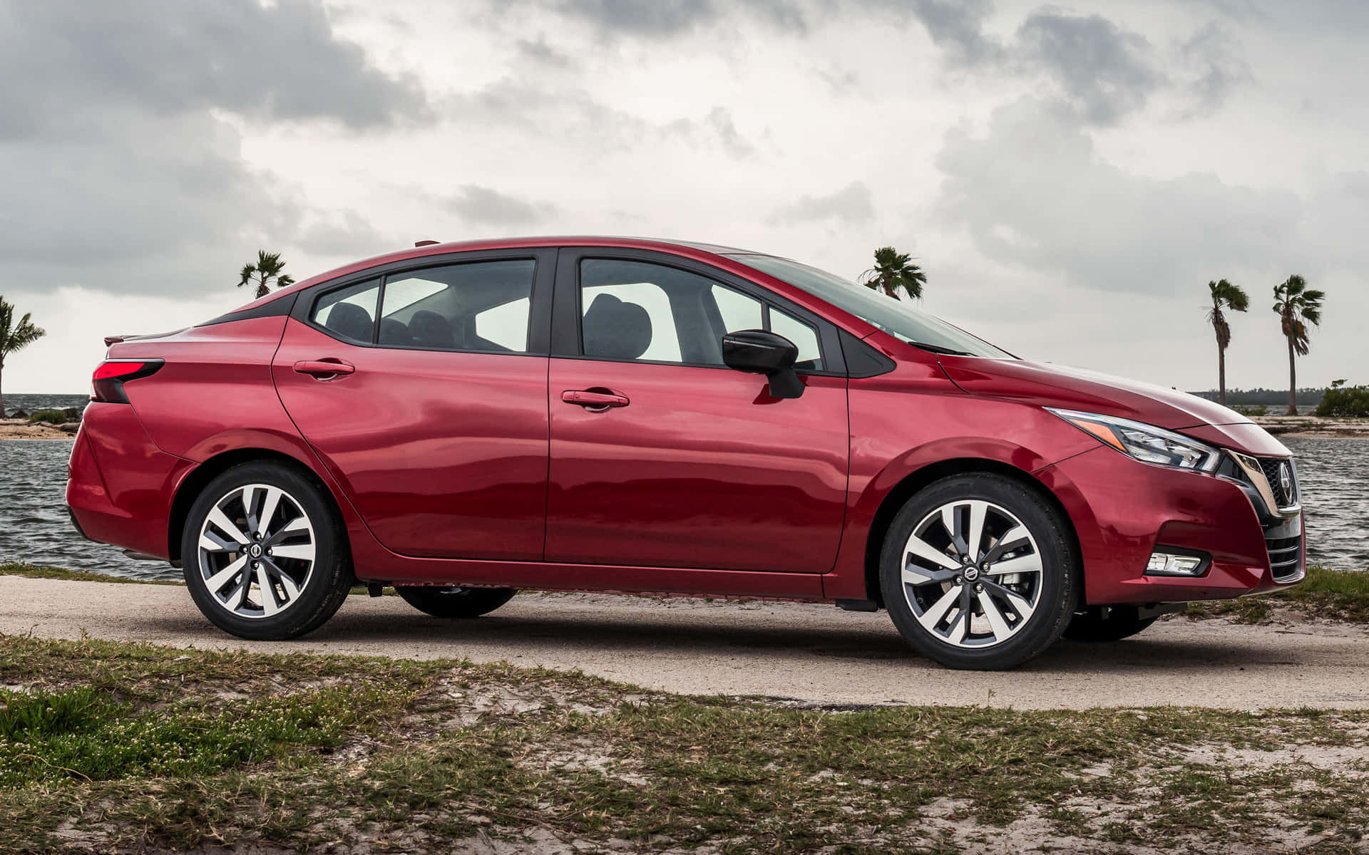 Nissan Versa, glossy red, sedan, Full HD Desktop Wallpaper