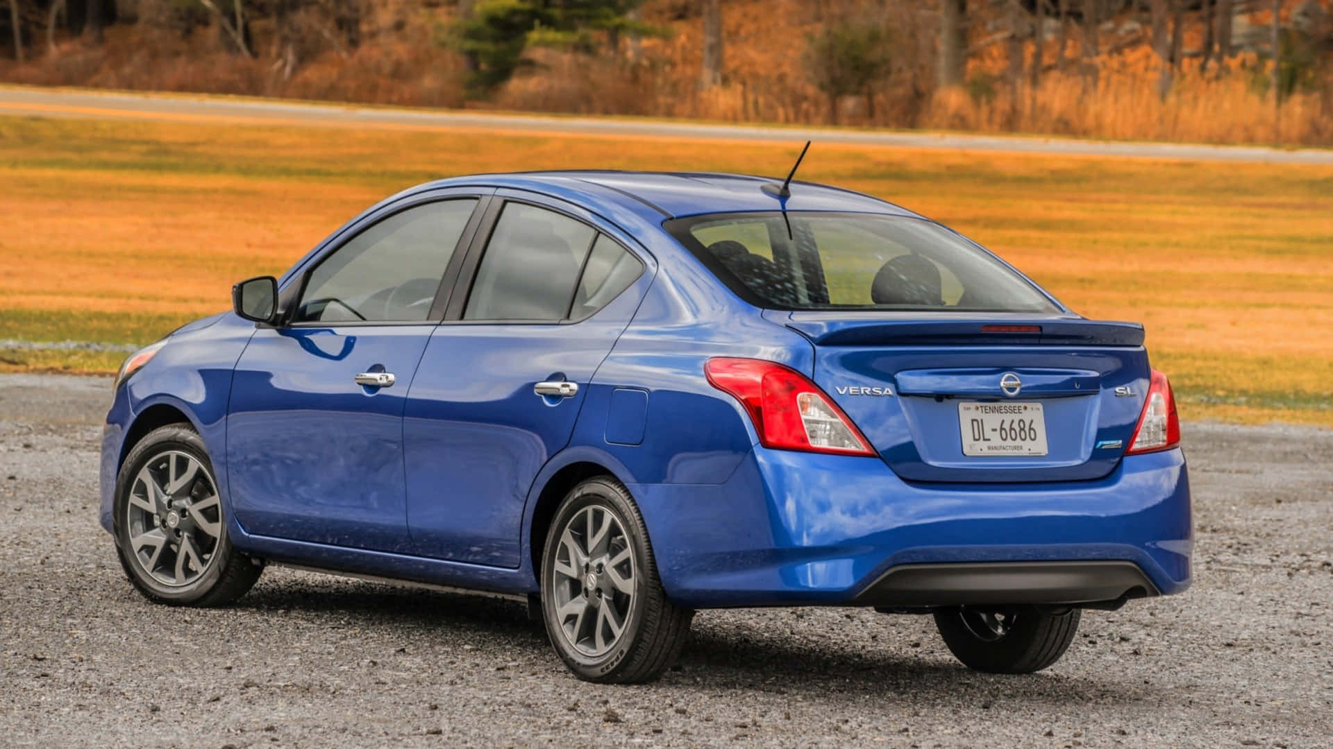 Nissan Versa, vibrant blue, sedan, Full HD Desktop Wallpaper