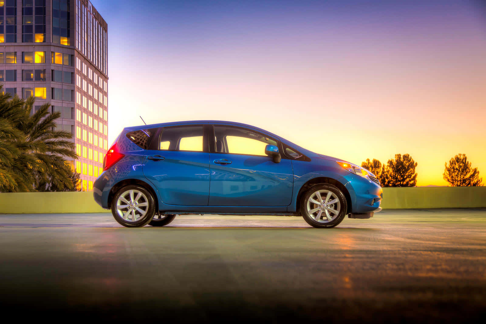 2022 Nissan Versa, sleek blue hatchback, rooftop, HD Desktop Wallpaper
