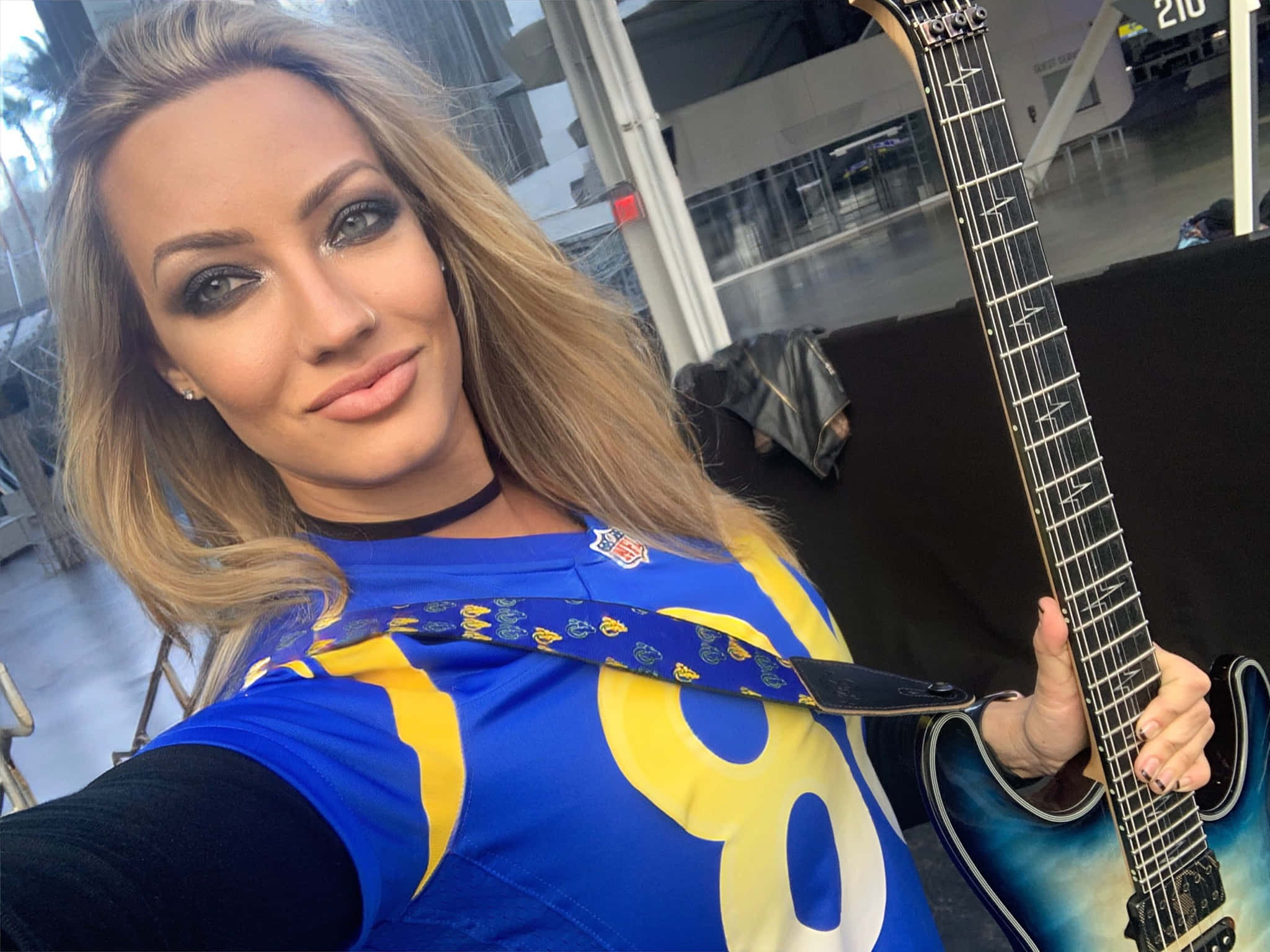 Nita Strauss, blue electric guitar, blue and yellow NFL jersey, Full HD Desktop Wallpaper