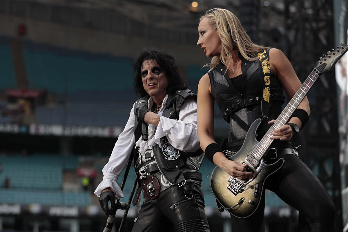 Nita Strauss, rock concert performance, black makeup, SD Desktop Wallpaper