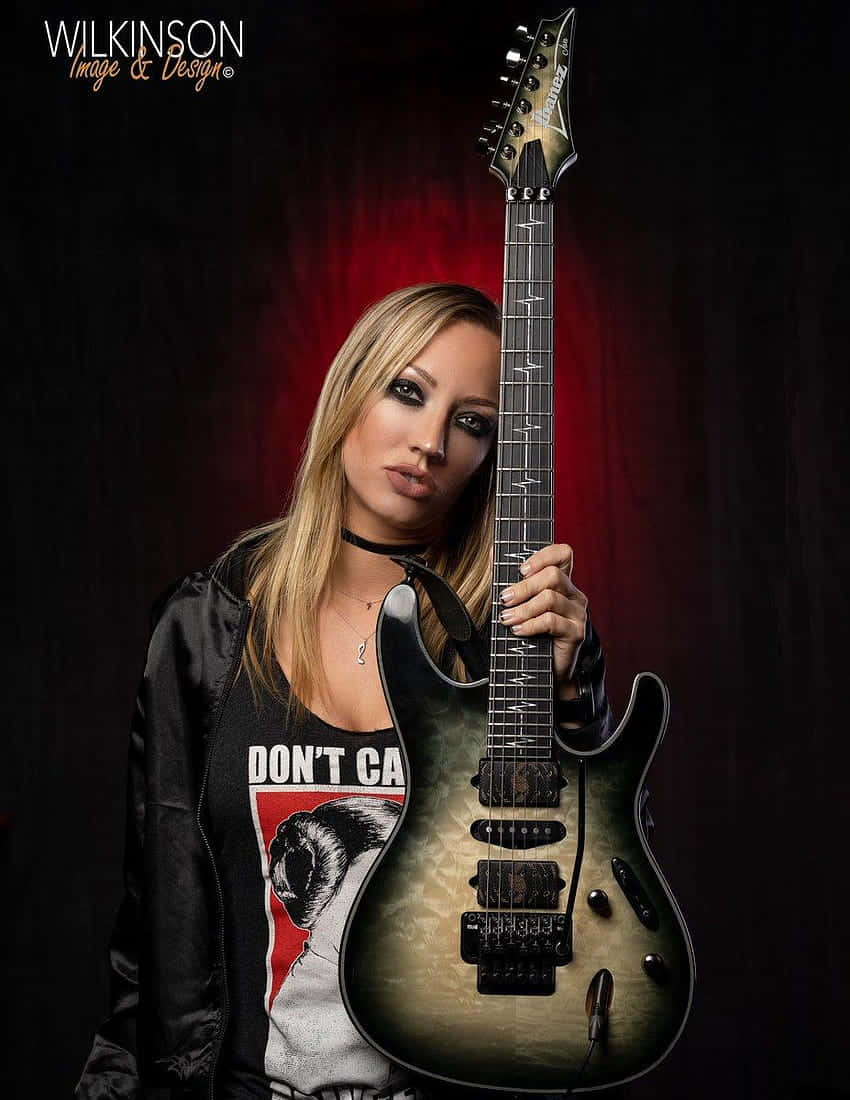 Nita Strauss, black electric guitar, sunburst electric guitar, SD Phone Wallpaper