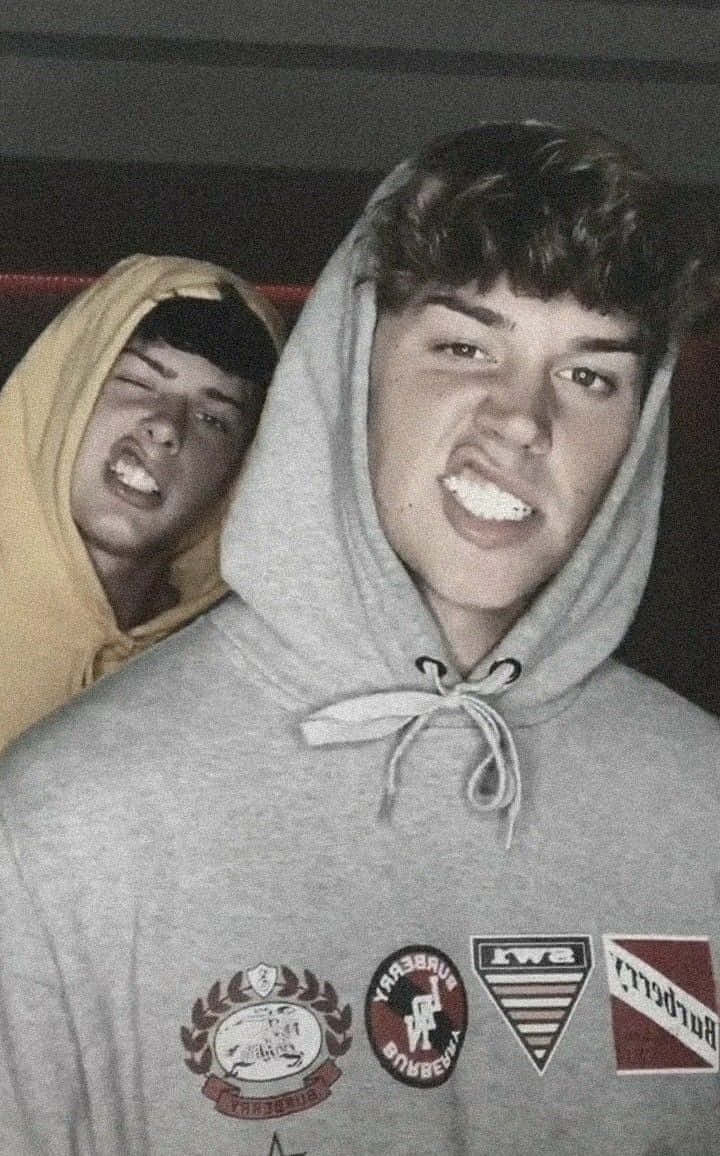 Noah Beck, hoodies, dimly lit indoor setting, SD Phone Wallpaper