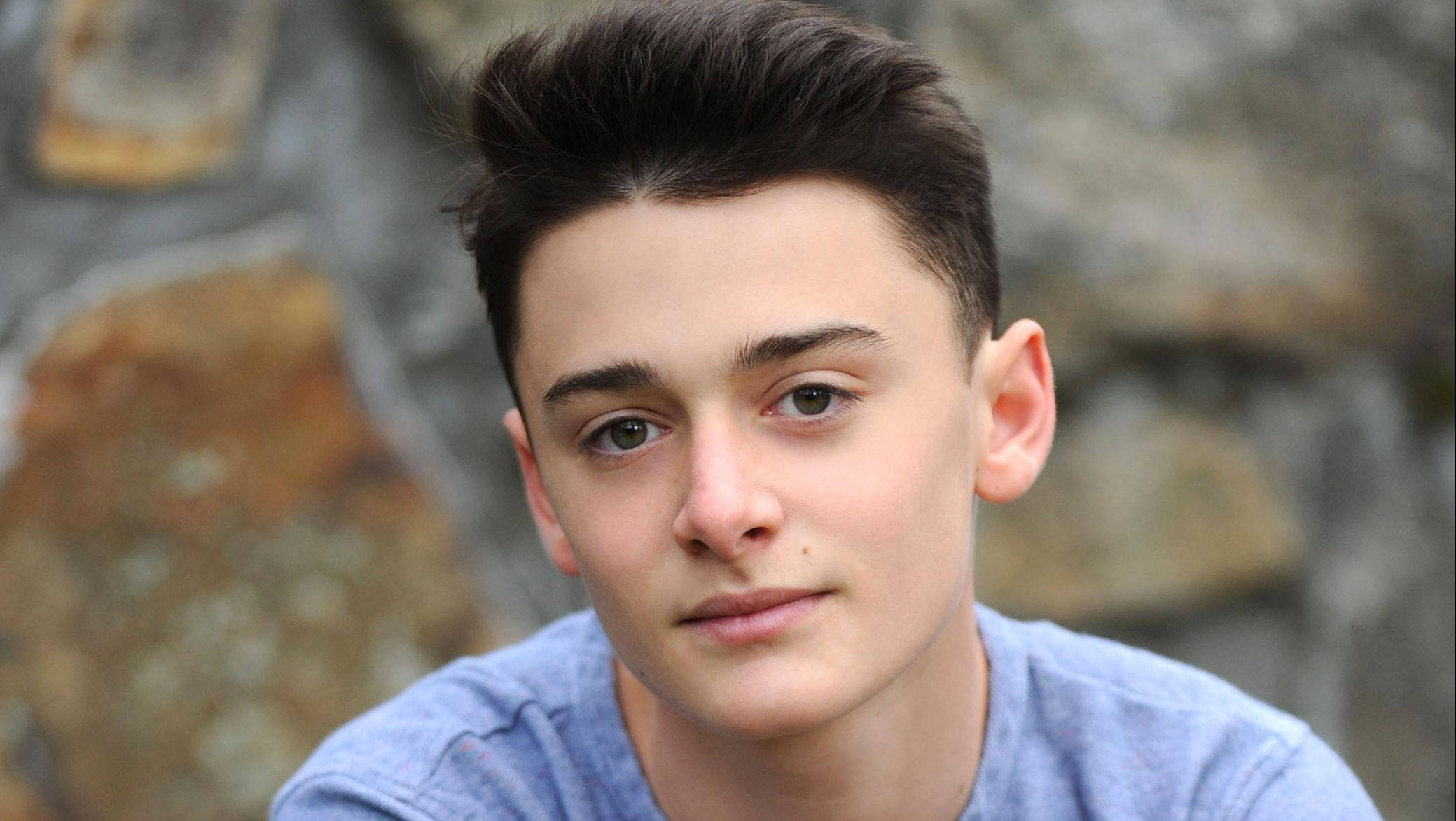Noah Schnapp, rock wall, stone wall, Full HD Desktop Wallpaper