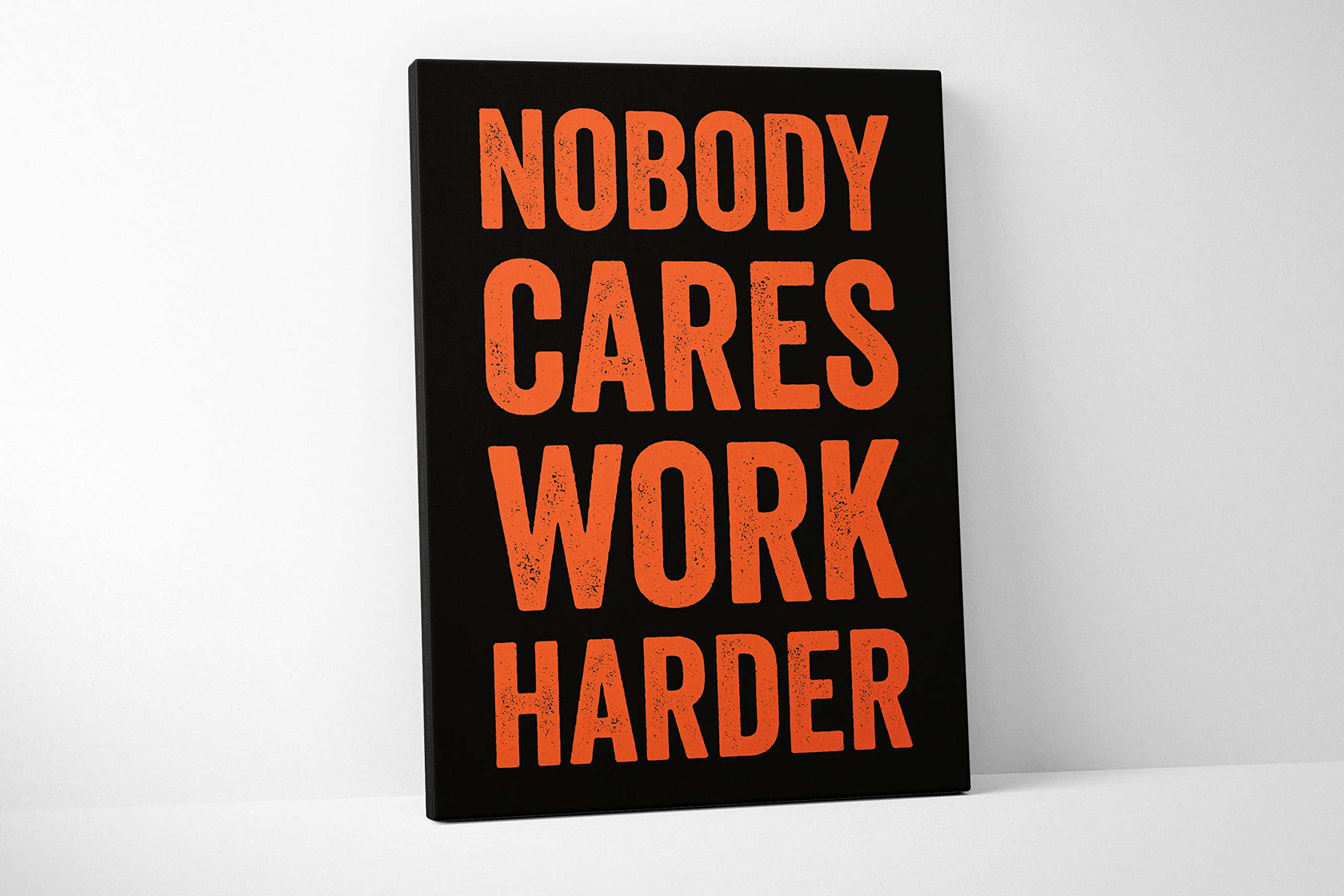 NOBODY CARES WORK HARDER, orange text, minimalist white wall, 2K Desktop Wallpaper