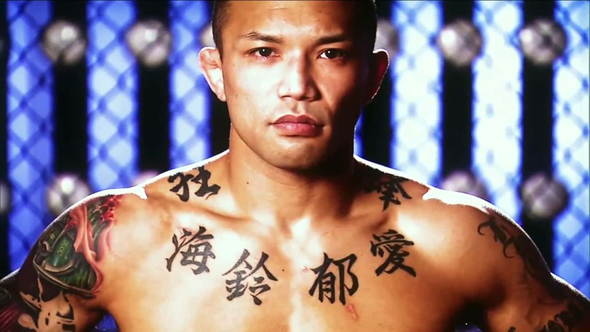 Norifumi Yamamoto, Chinese characters tattooed across his chest, blue chain-link fence backdrop, Full HD Desktop Wallpaper