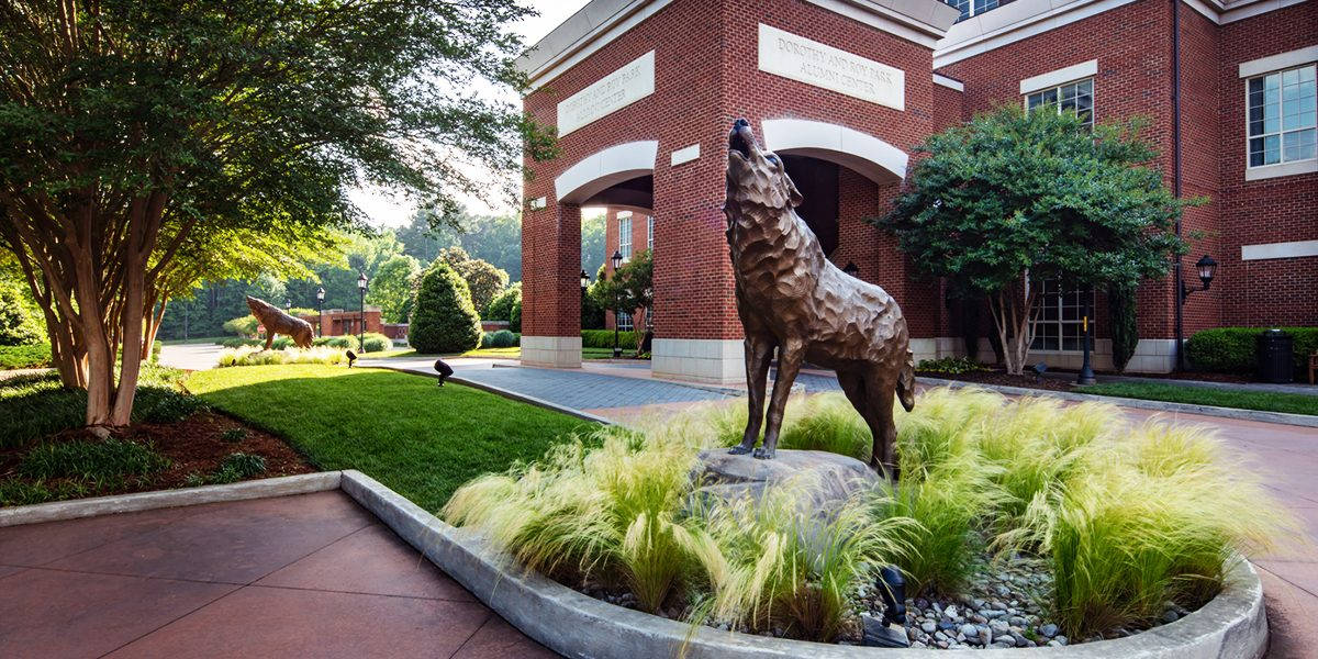 North Carolina State University, bronze wolf statue, stone pedestal, SD Desktop Wallpaper