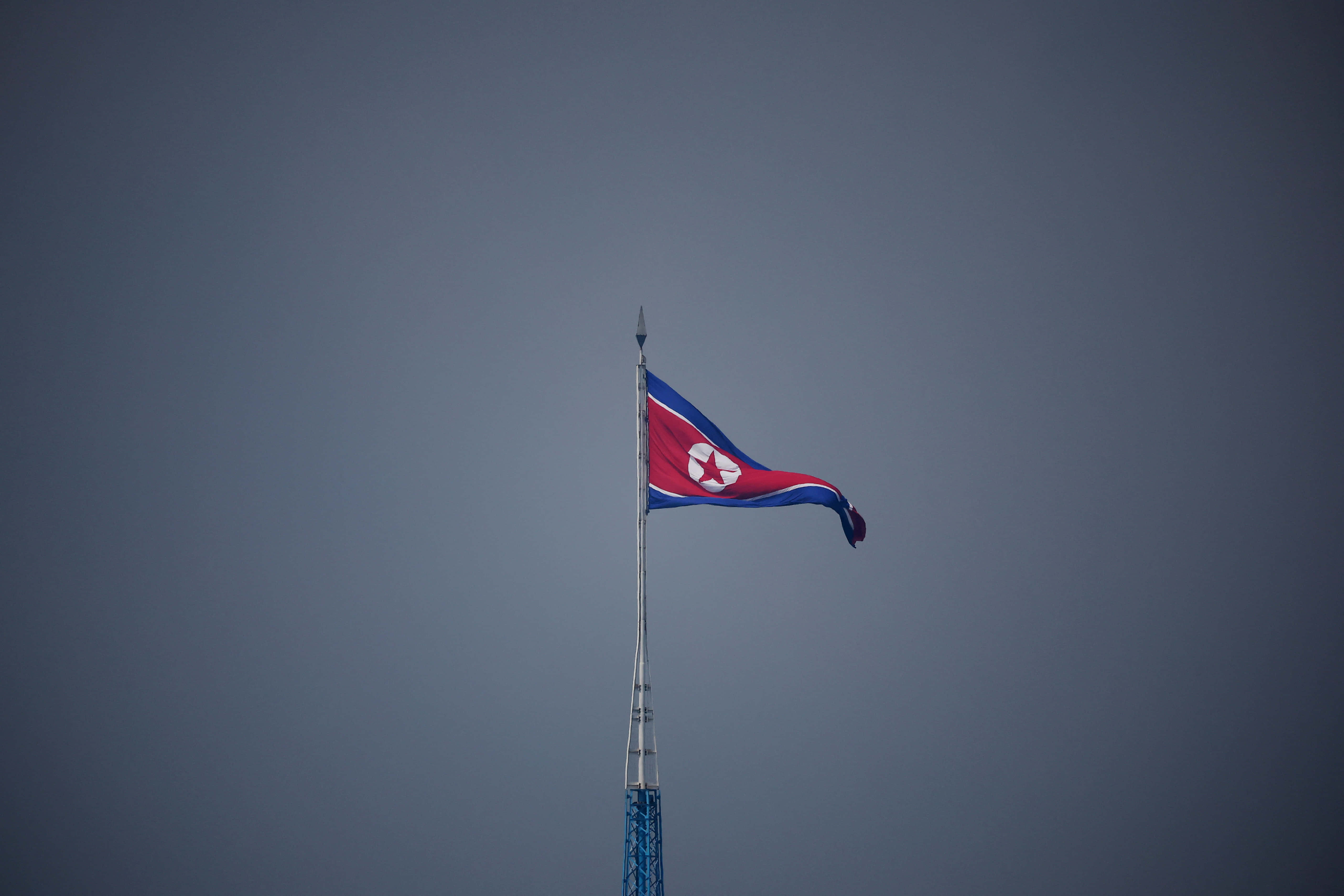 flag of north korea, tall pole, muted gray sky, 5K Desktop Wallpaper