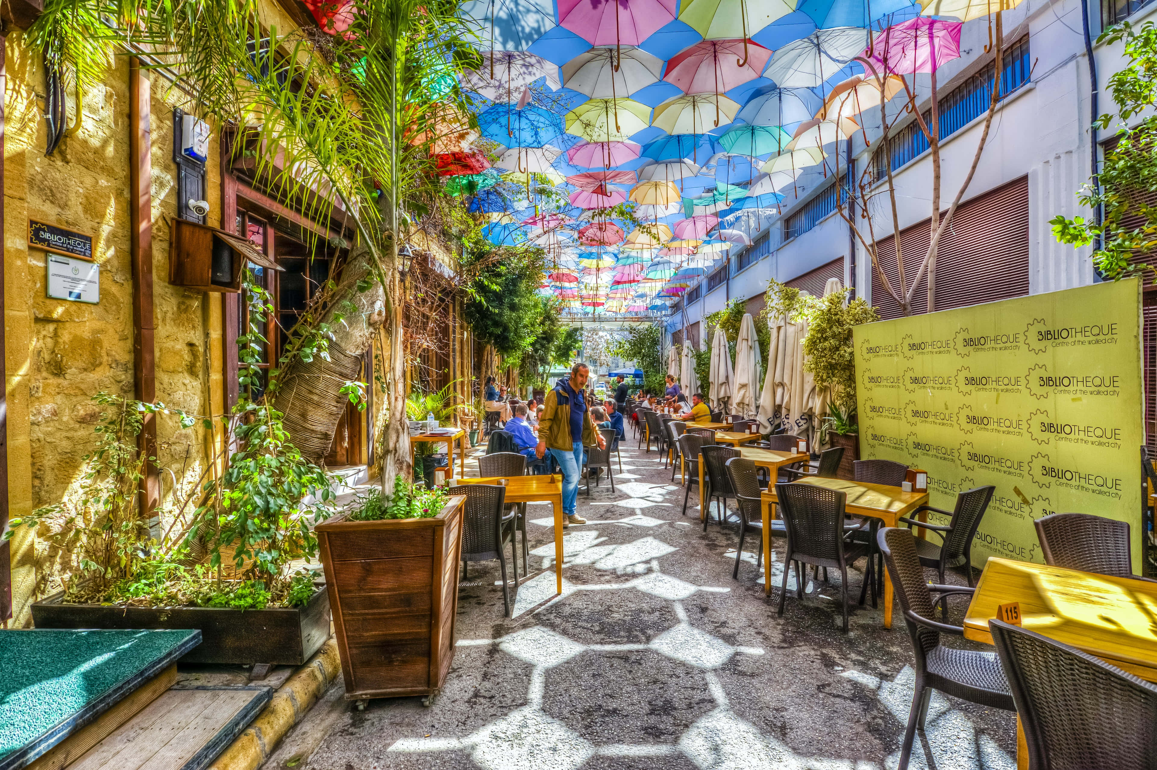 colorful street in northern cyprus, alleyway cafe, colorful canopy of umbrellas, 4K Desktop Wallpaper