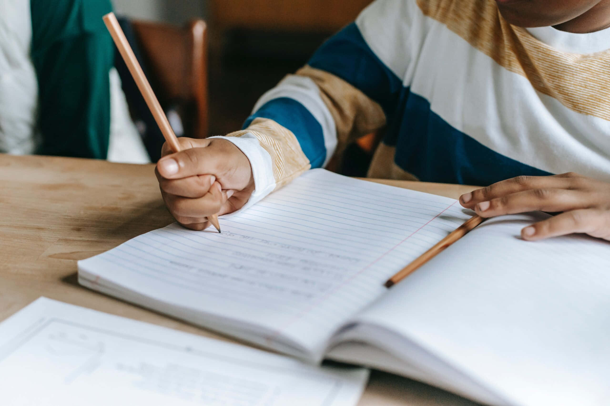 child's hand, notebook, wooden pencil, 2K Desktop Wallpaper