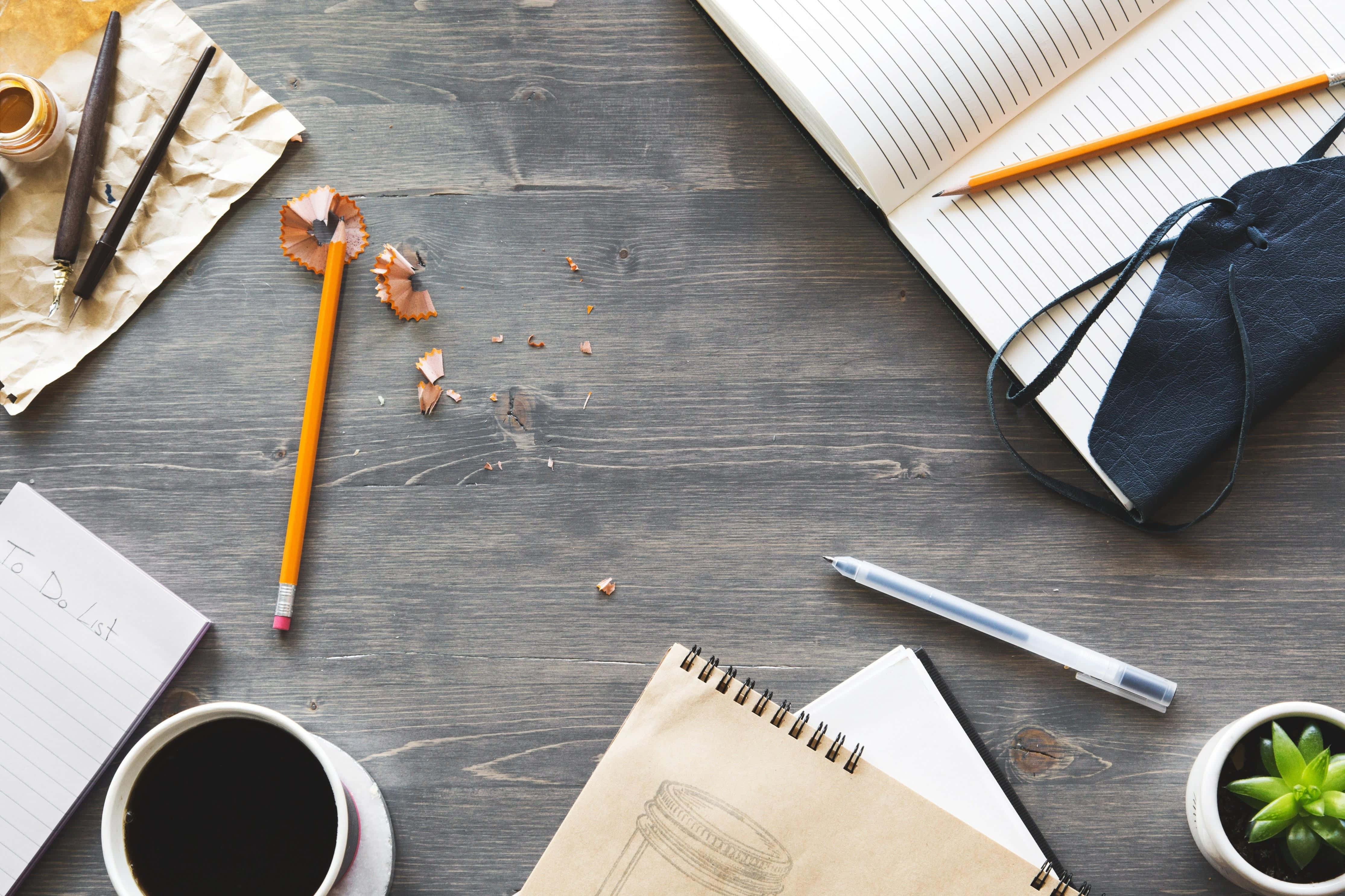 rustic wooden desk, pencils shavings, notebooks, 4K Desktop Wallpaper