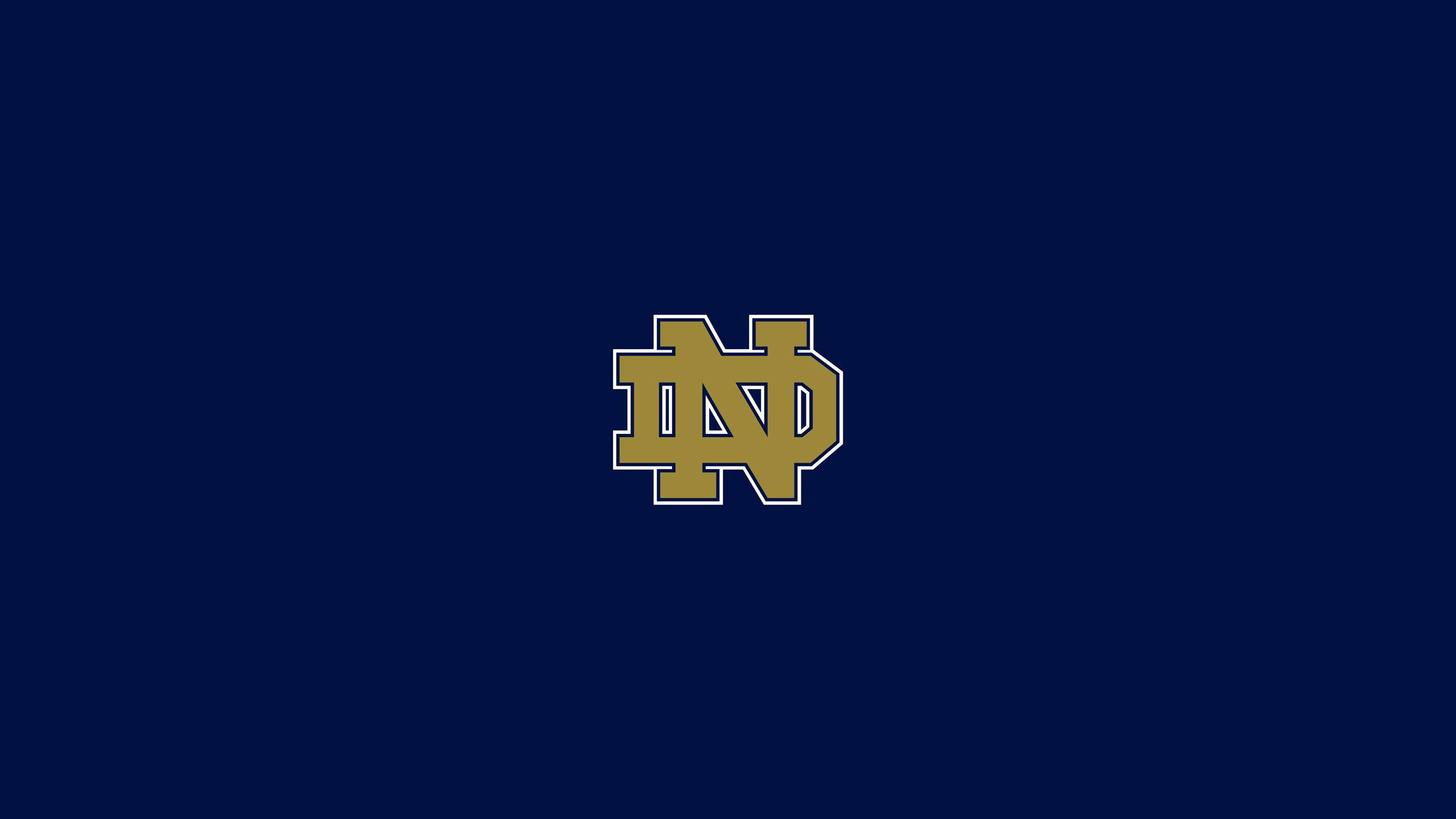 notre dame football, gold interlocking ND logo, navy blue background, 2K Desktop Wallpaper