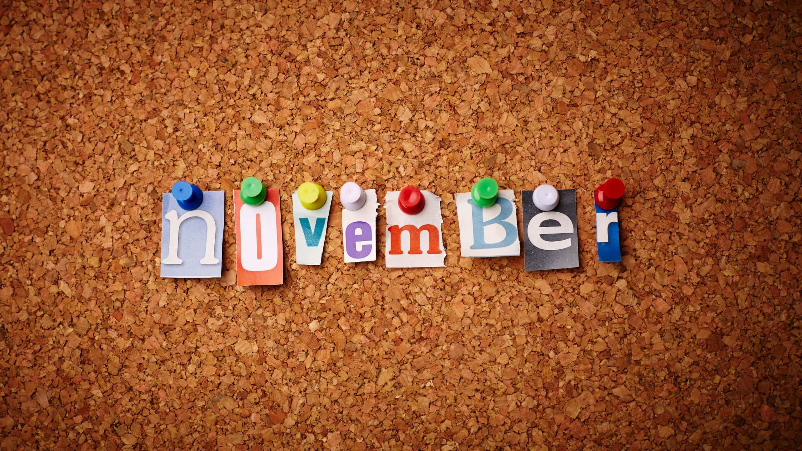 november, colorful paper letters, textured corkboard, 2K Desktop Wallpaper