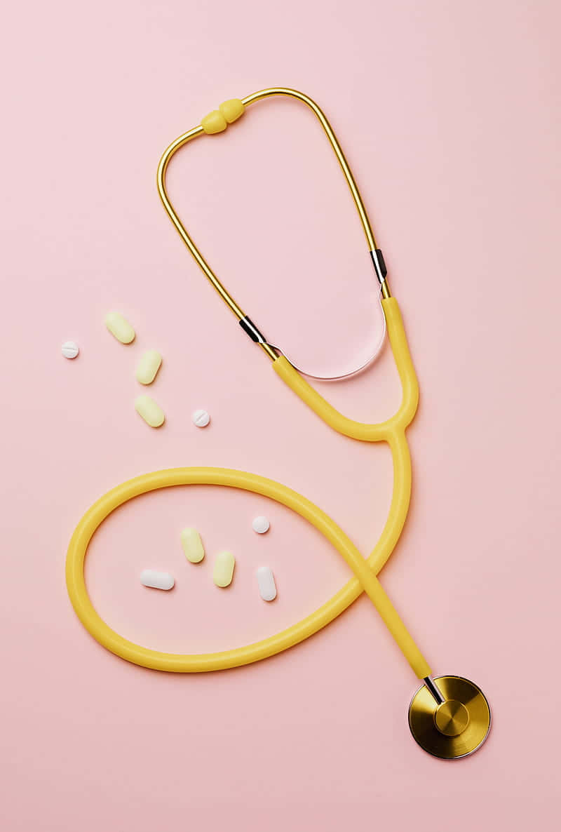 Nurse Phone, yellow stethoscope, scattered pills, SD Phone Wallpaper