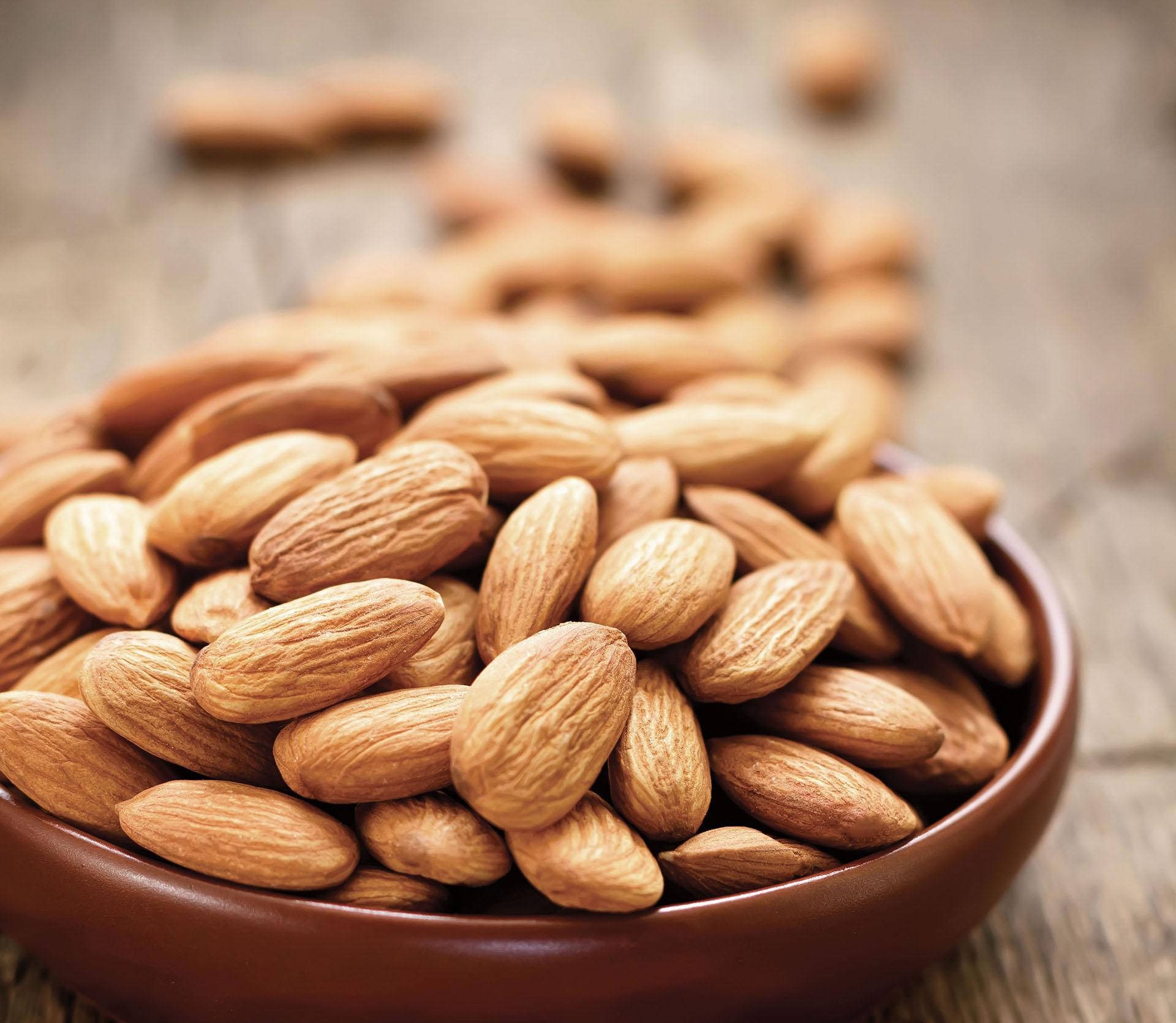 premium almond nuts, shallow brown bowl, textured almonds, Full HD Desktop Wallpaper