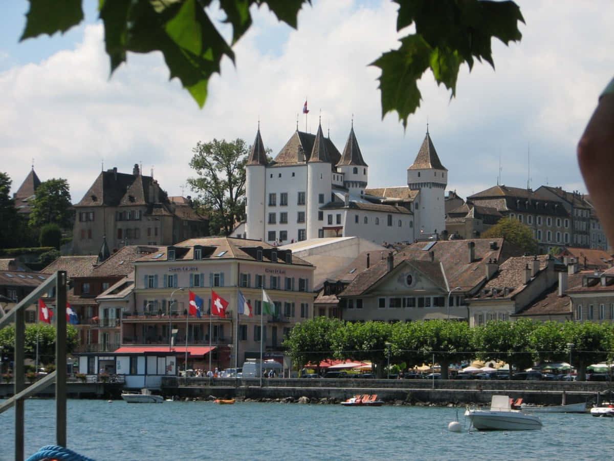 Nyon Switzerland, historic white castle, red-roofed buildings, SD Desktop Wallpaper